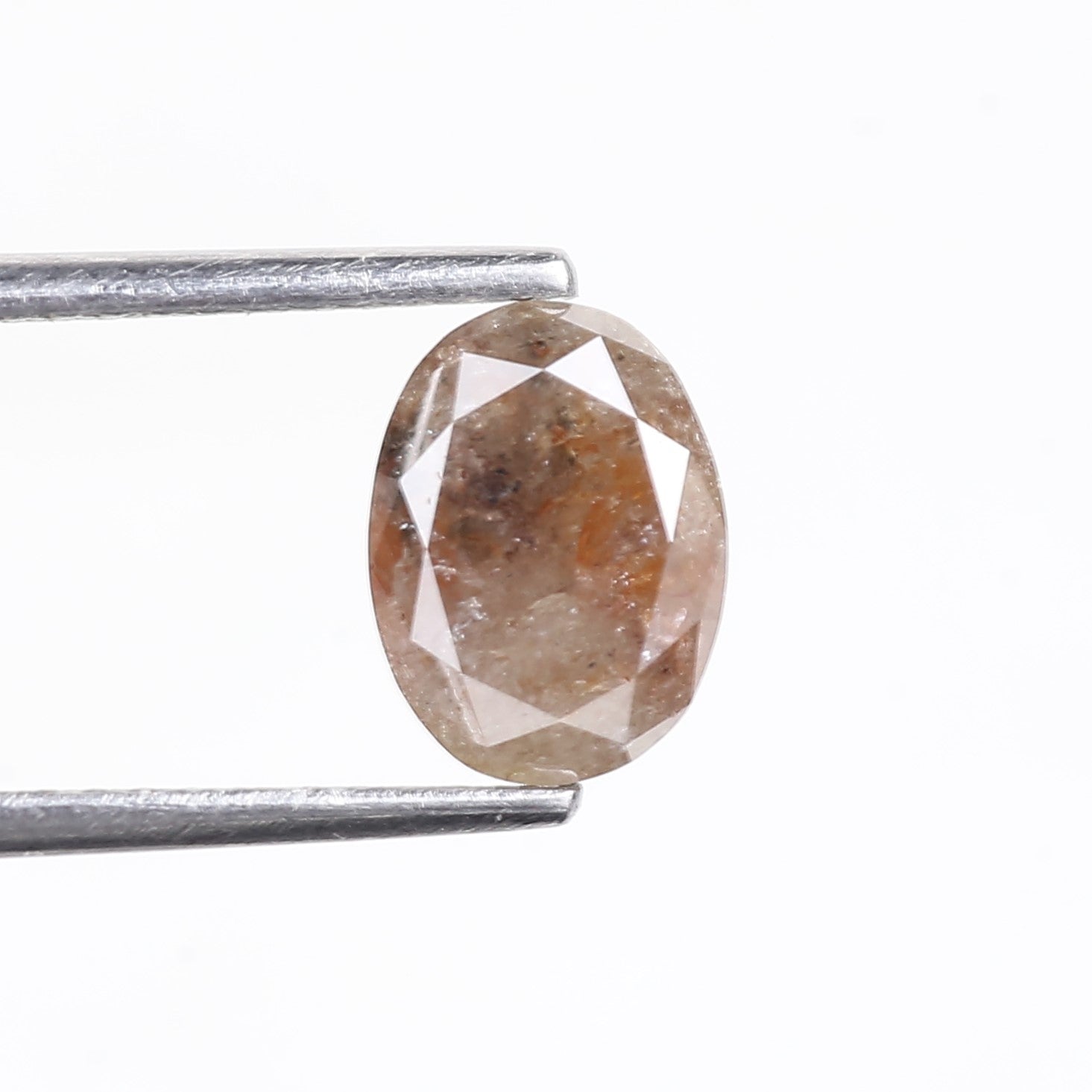 1.42 Carat Natural Orange Oval Salt Pepper Diamond 8.1 MM