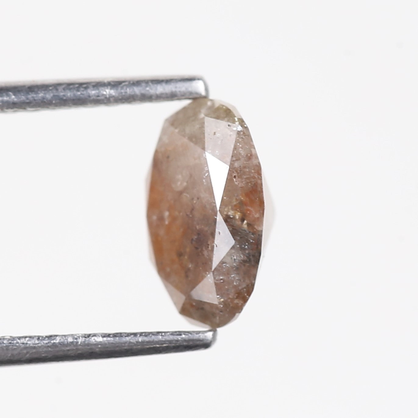 1.42 Carat Natural Orange Oval Salt Pepper Diamond 8.1 MM