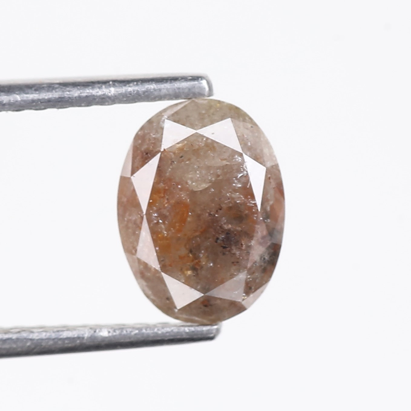 1.42 Carat Natural Orange Oval Salt Pepper Diamond 8.1 MM