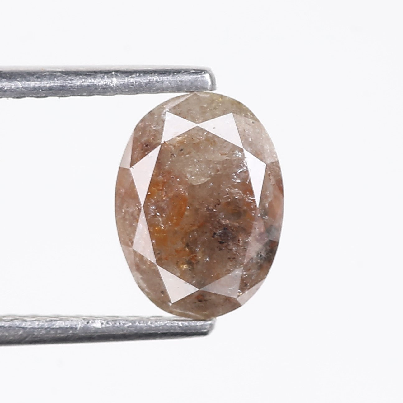 1.42 Carat Natural Orange Oval Salt Pepper Diamond 8.1 MM