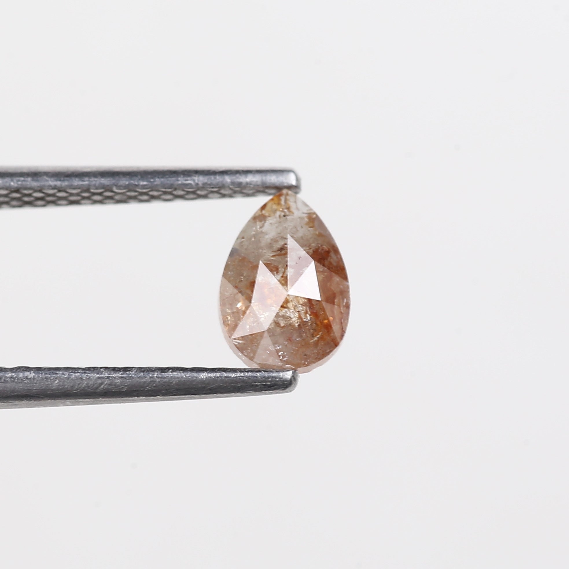 0.56 Carat Natural Orange Pear Salt Pepper Diamond 6.5 MM