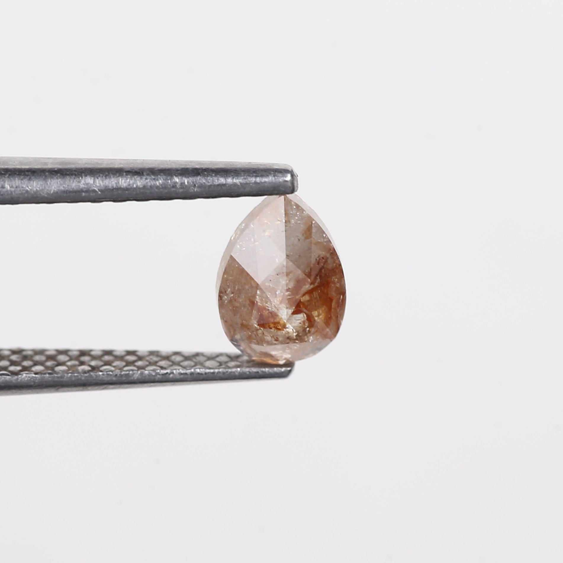 0.56 Carat Natural Orange Pear Salt Pepper Diamond 6.5 MM