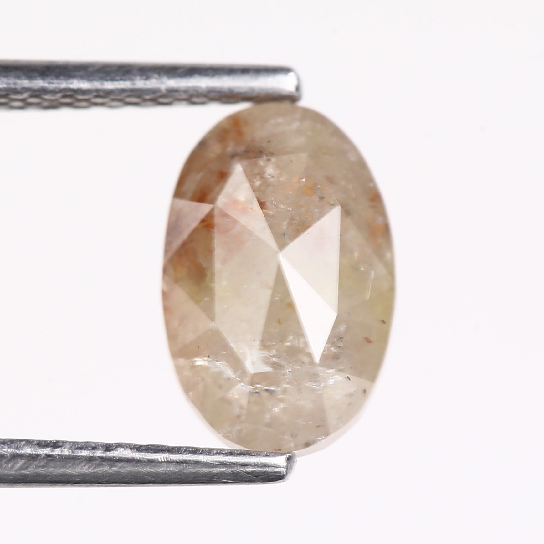 1.70 Carat Natural Oval Cut Orange Salt And Pepper Diamond 8.91 MM