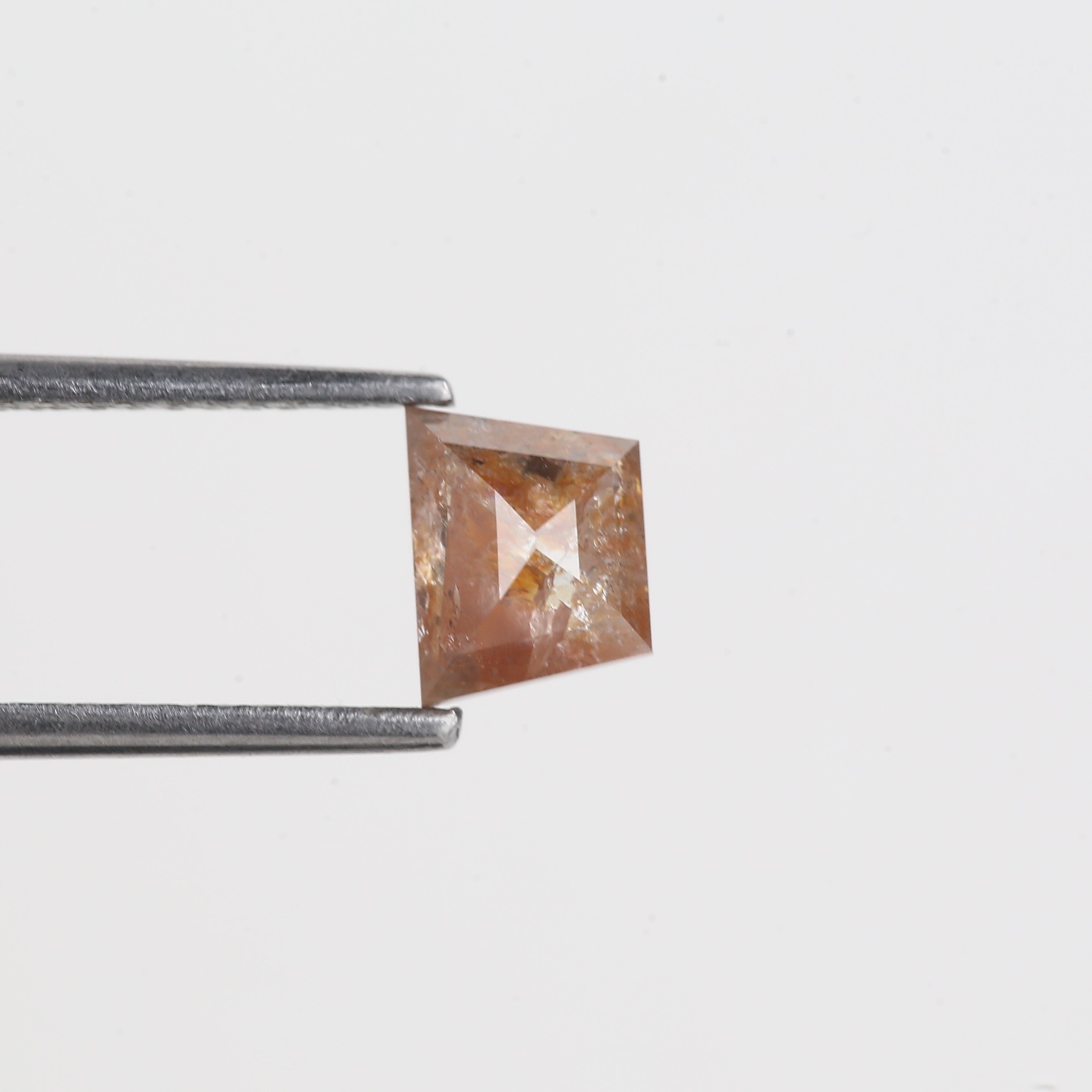 0.92 Carat Trapezoid Natural Orange Salt And Pepper Diamond 6.25 MM