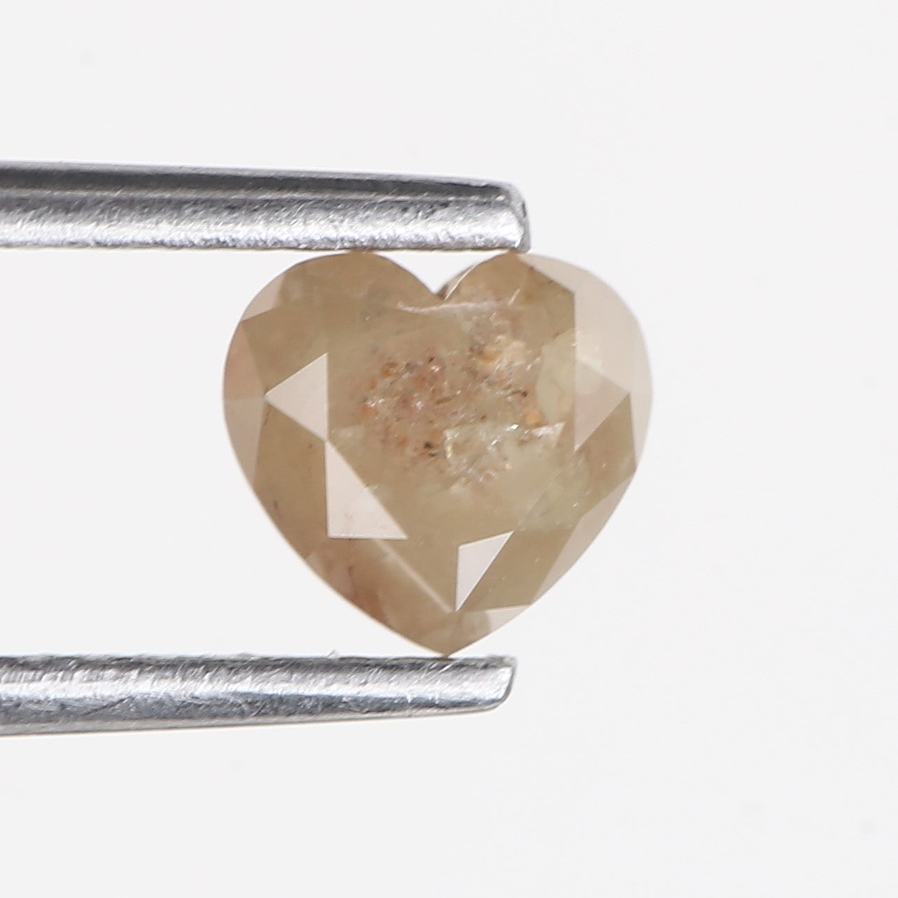 0.69 Carat Natural Peach Brown Heart Shape Salt And Pepper Diamond 5.05 MM