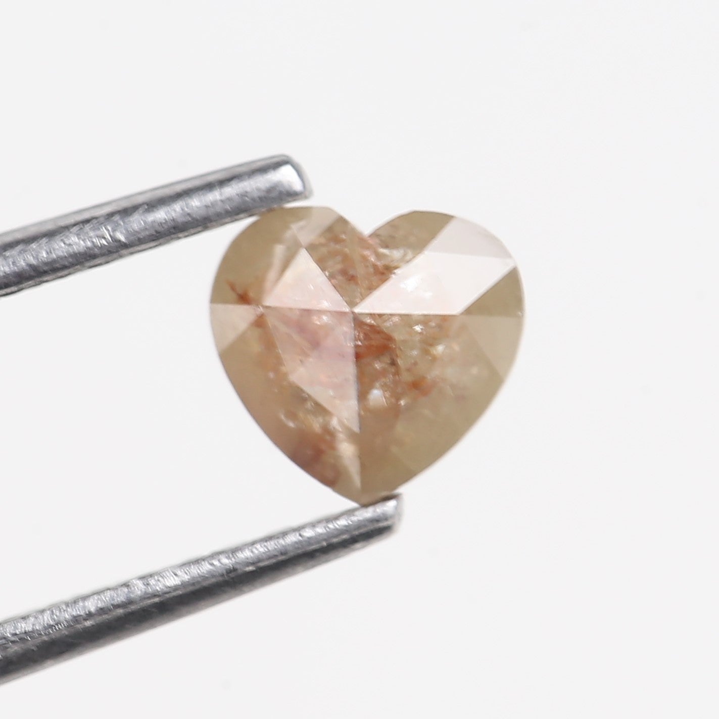 0.69 Carat Natural Peach Brown Heart Shape Salt And Pepper Diamond 5.05 MM