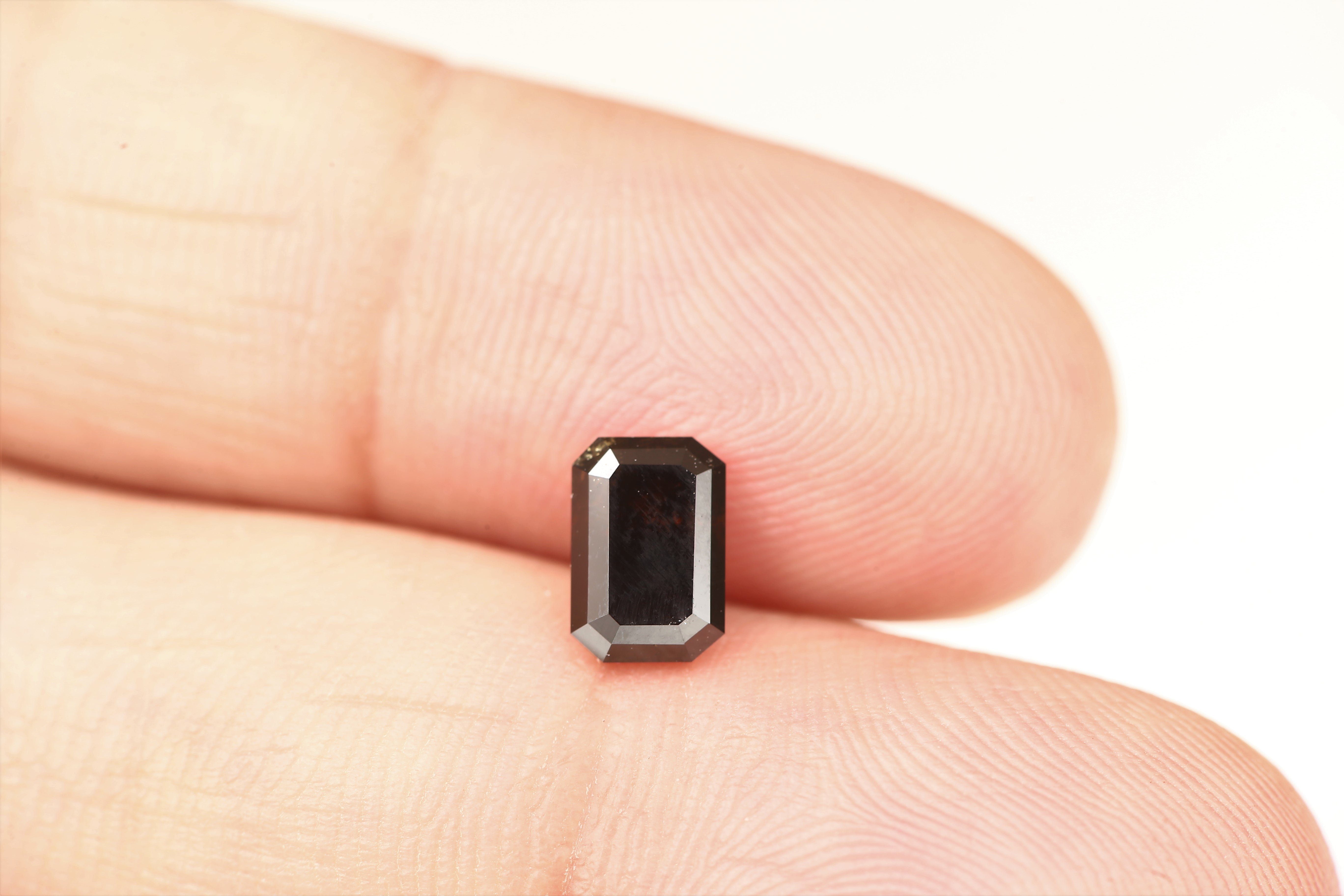 1.10 Carat 6.85 MM Fancy Cognac Emerald Cut Salt and Pepper Diamond - Blackdiamond