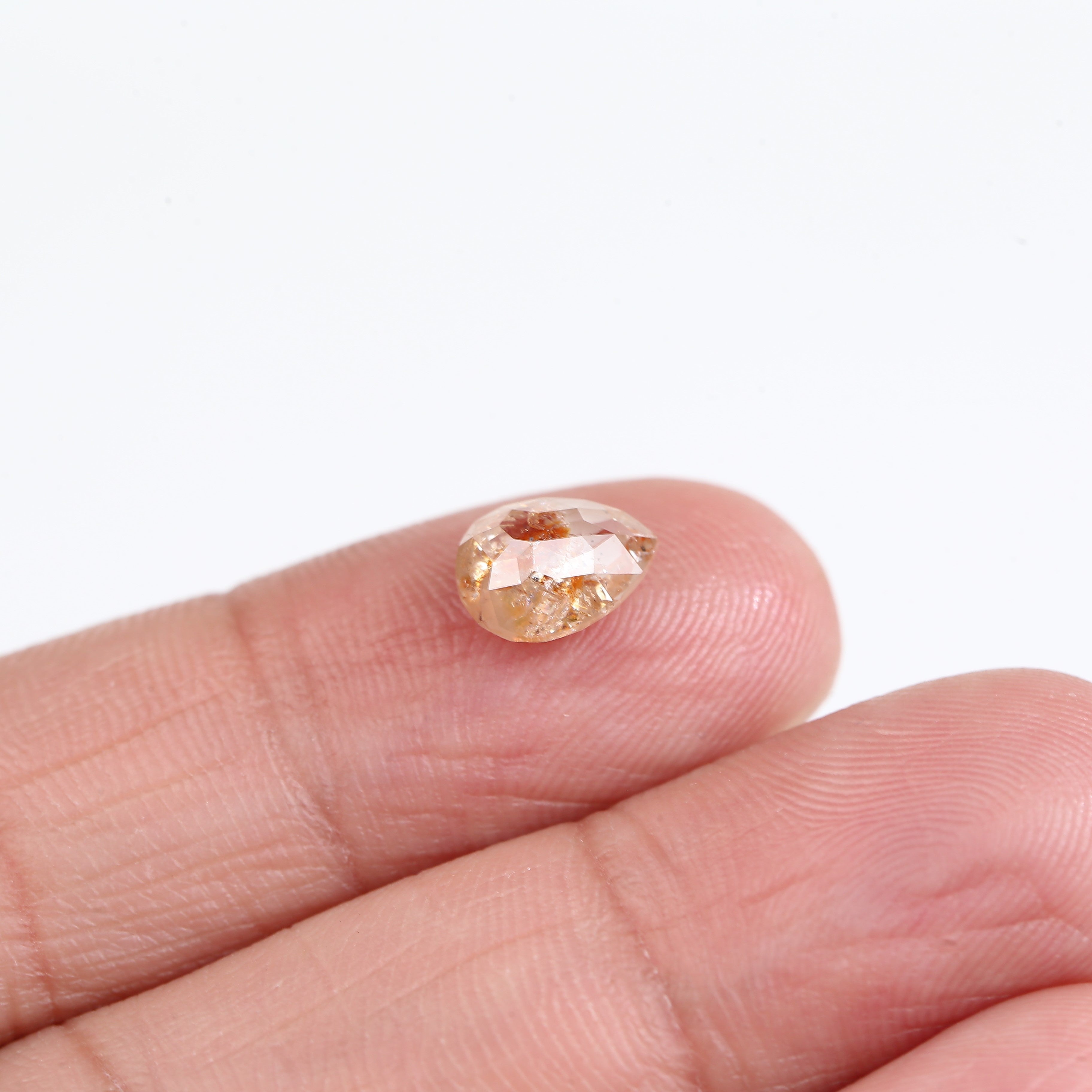 1.54 Carat Natural Orange Pear Cut Salt And Pepper Diamond 8.18 MM