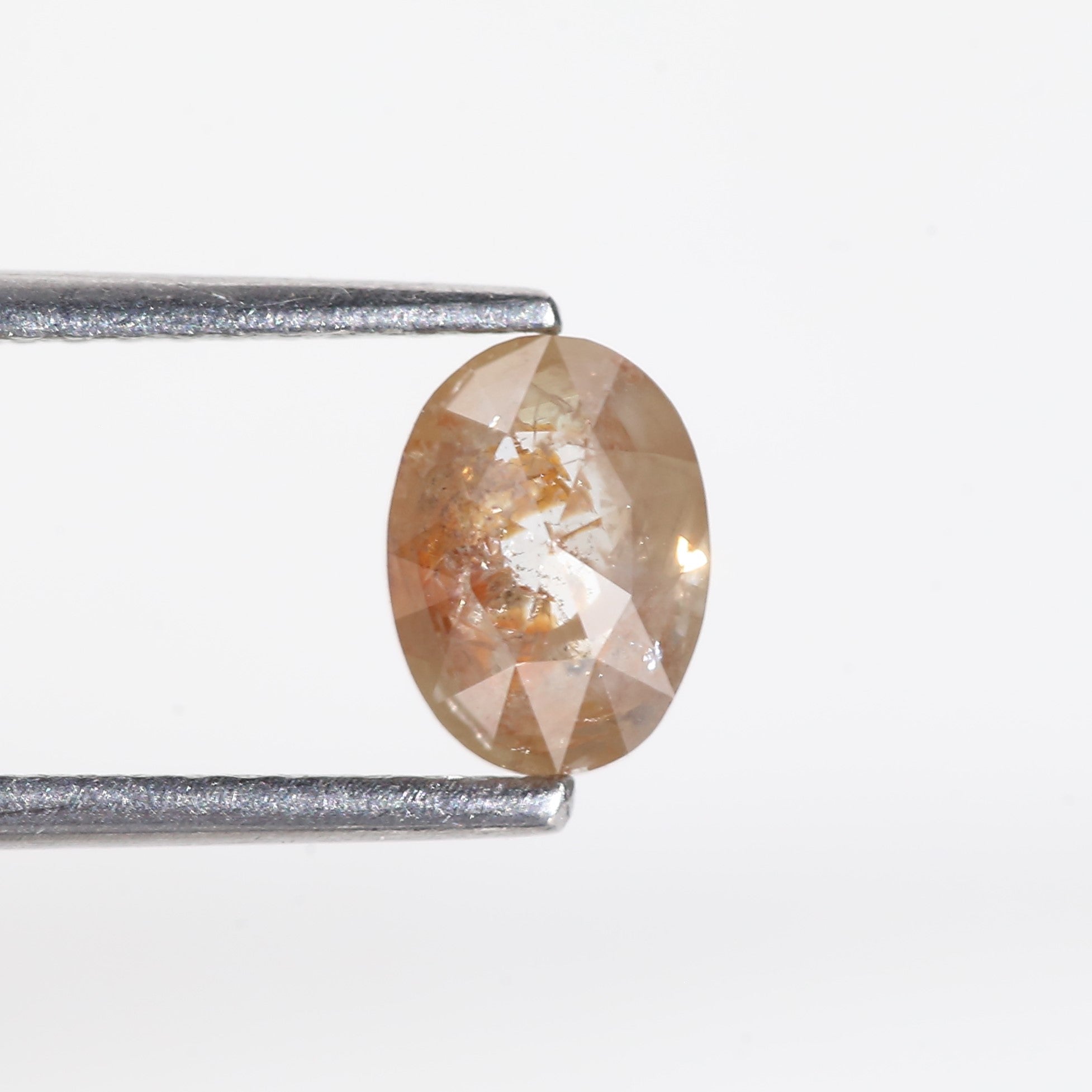 1 Carat Orange Oval Salt and Pepper Diamond 6.7 MM