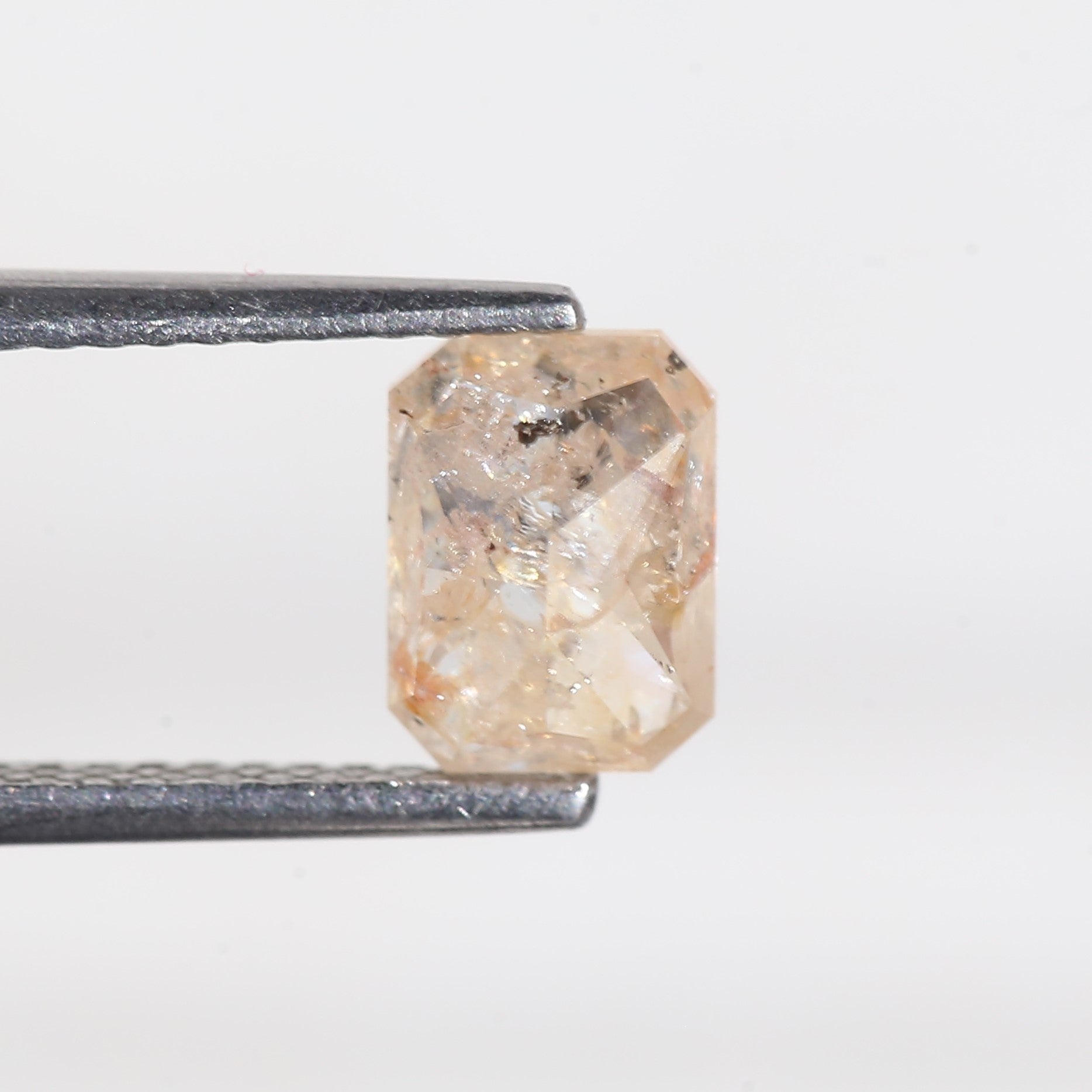 1.4 Carat Orange Emerald Cut Salt and Pepper Diamond 7 MM