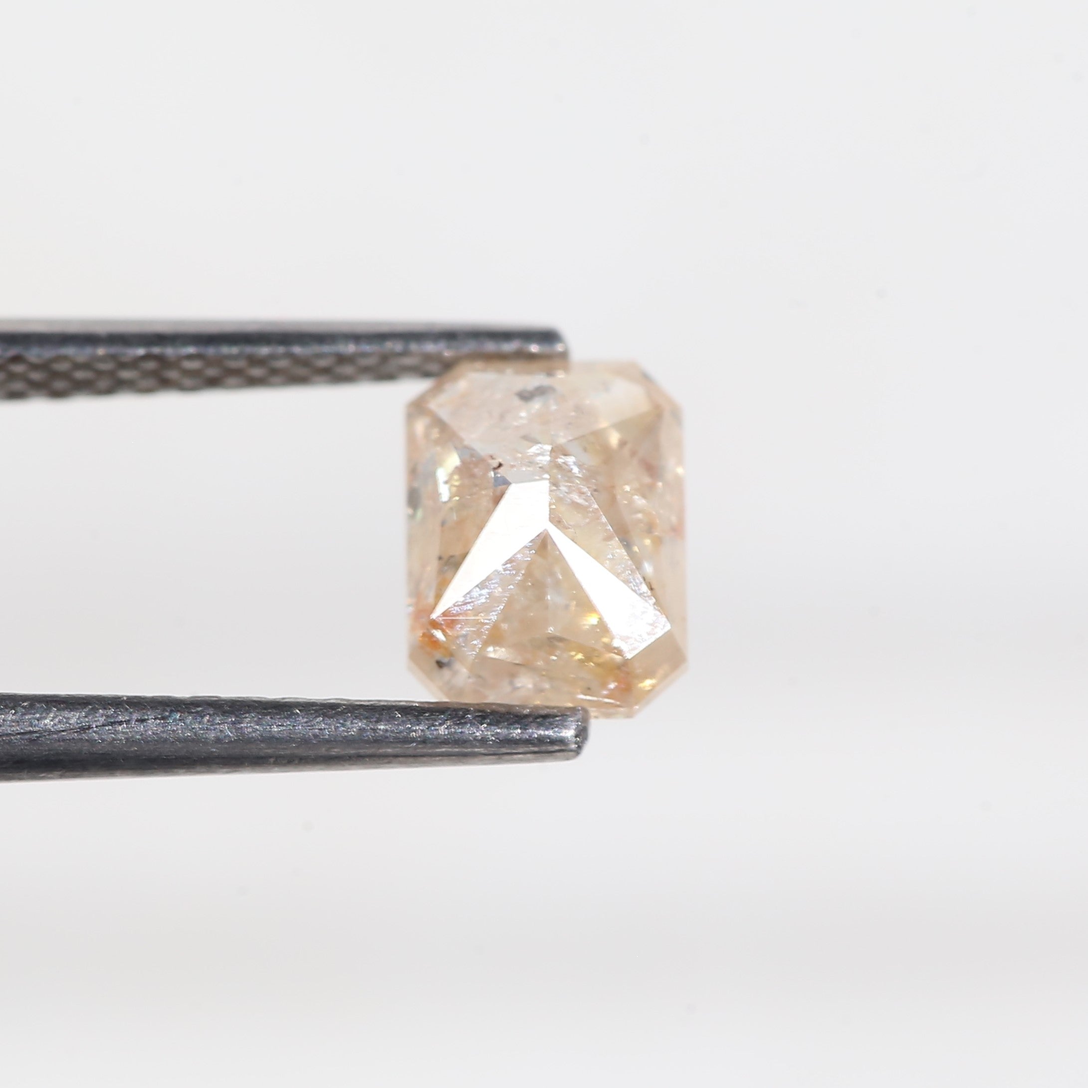 1.4 Carat Orange Emerald Cut Salt and Pepper Diamond 7 MM