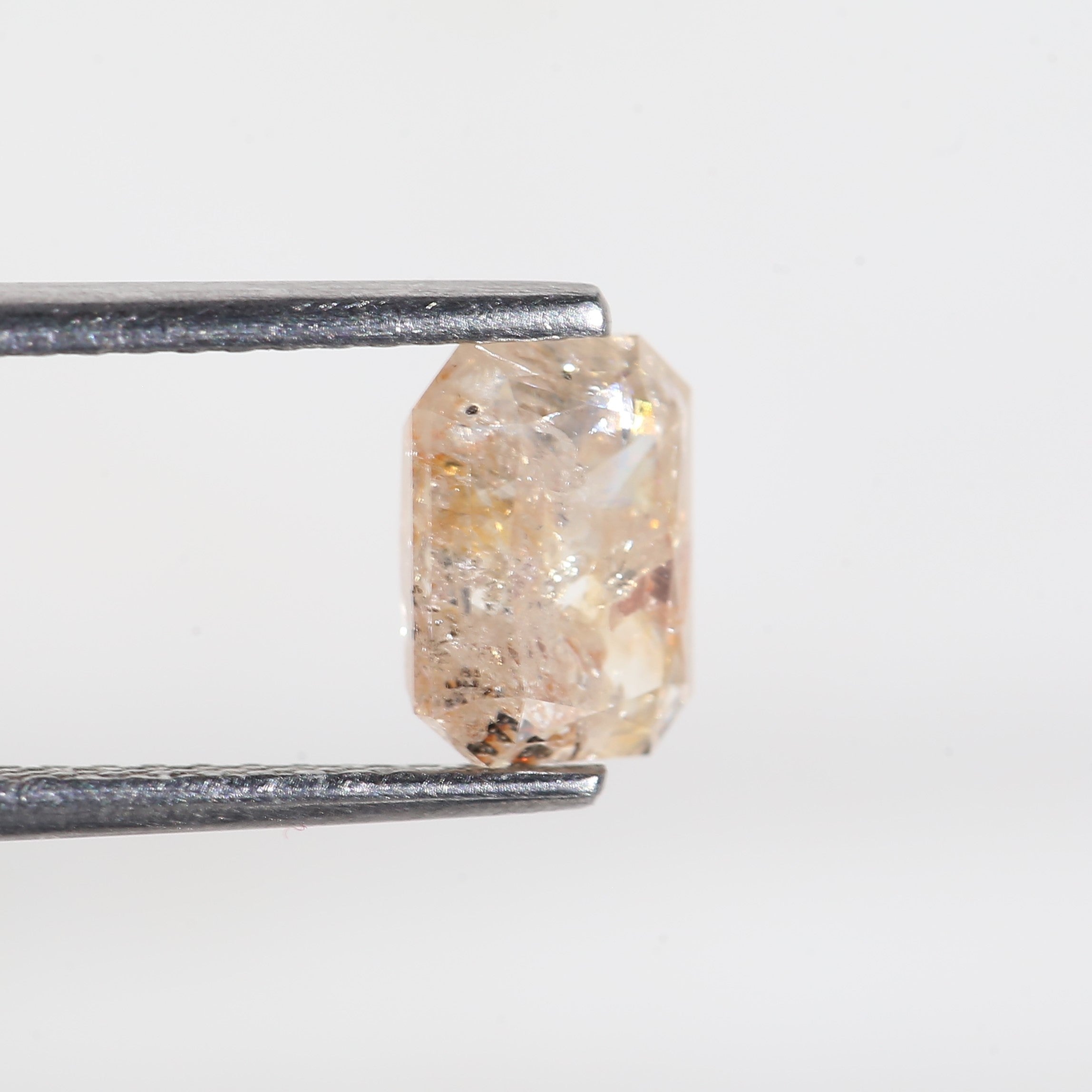 1.4 Carat Orange Emerald Cut Salt and Pepper Diamond 7 MM