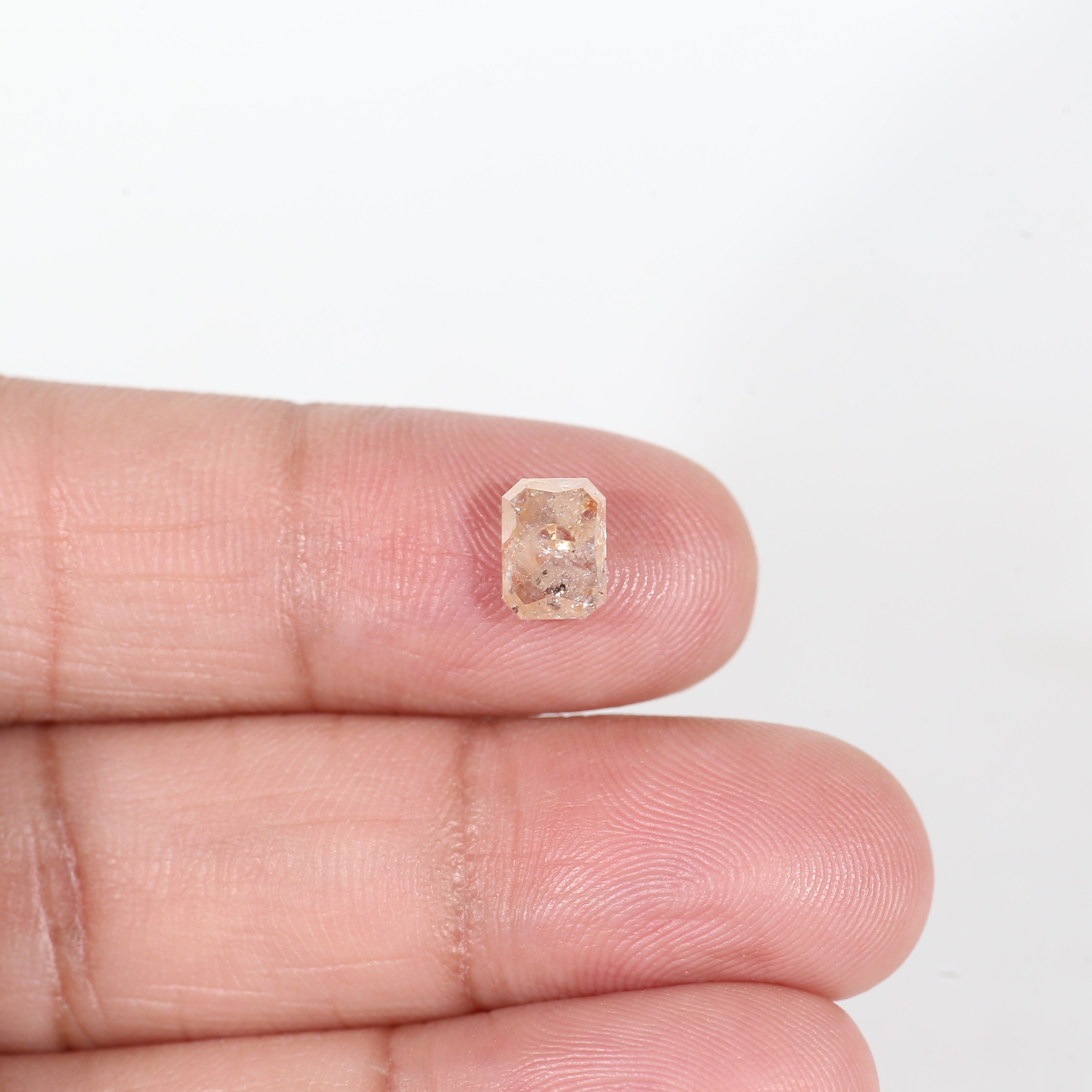 1.4 Carat Orange Emerald Cut Salt and Pepper Diamond 7 MM