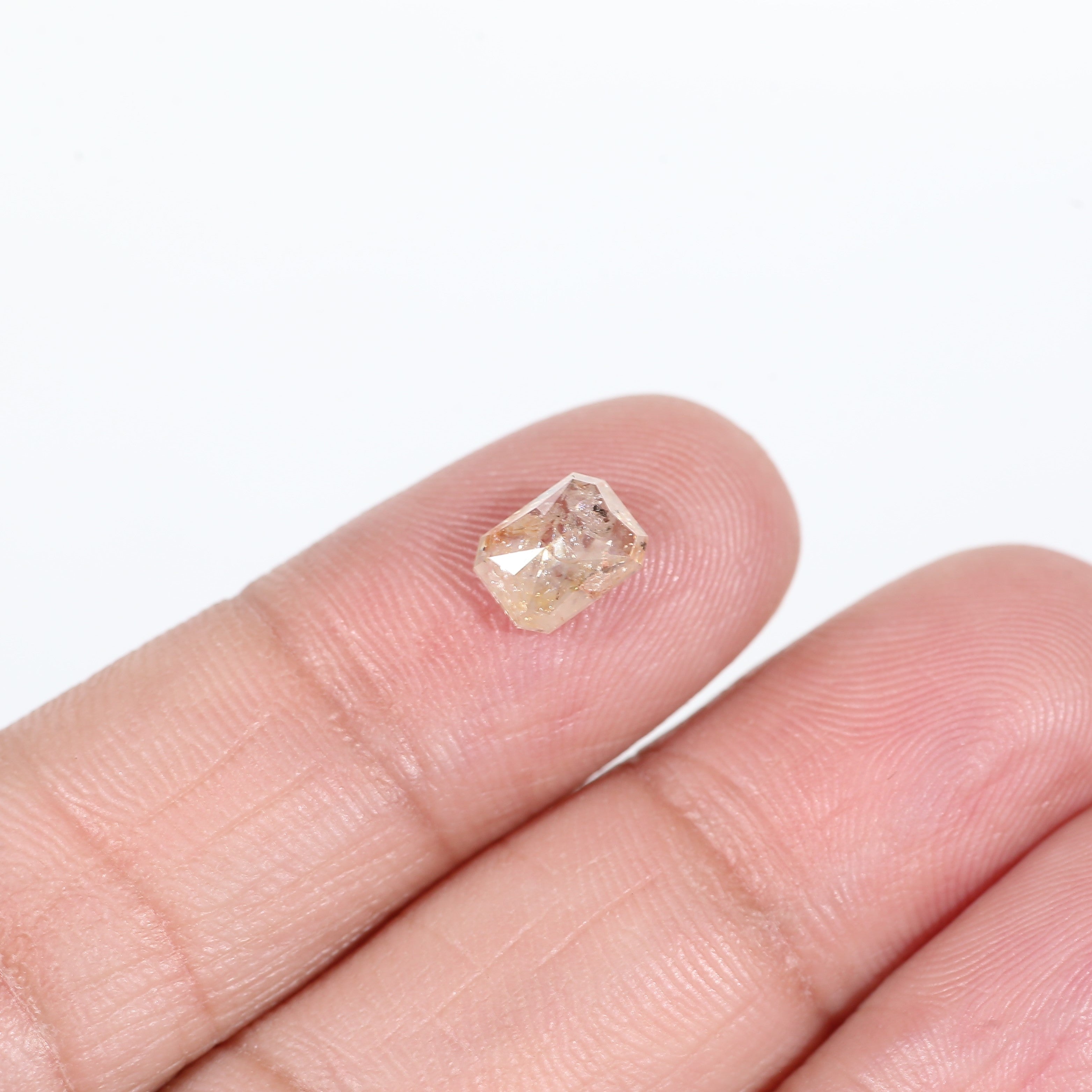 1.4 Carat Orange Emerald Cut Salt and Pepper Diamond 7 MM