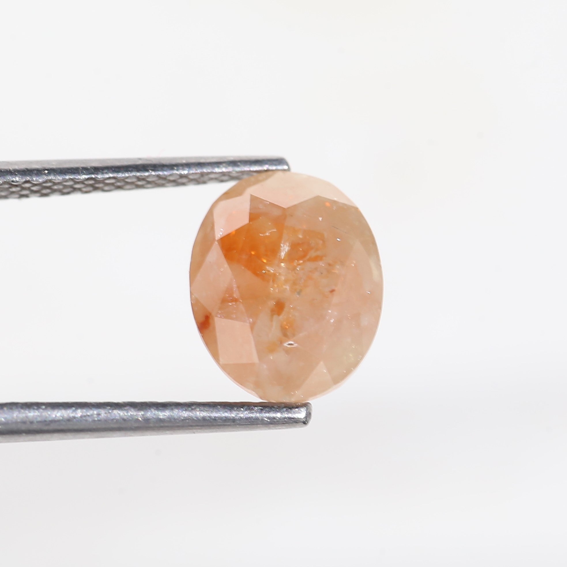 2.57 Carat Oval Cut Orange Salt and Pepper Diamond 7.4 MM