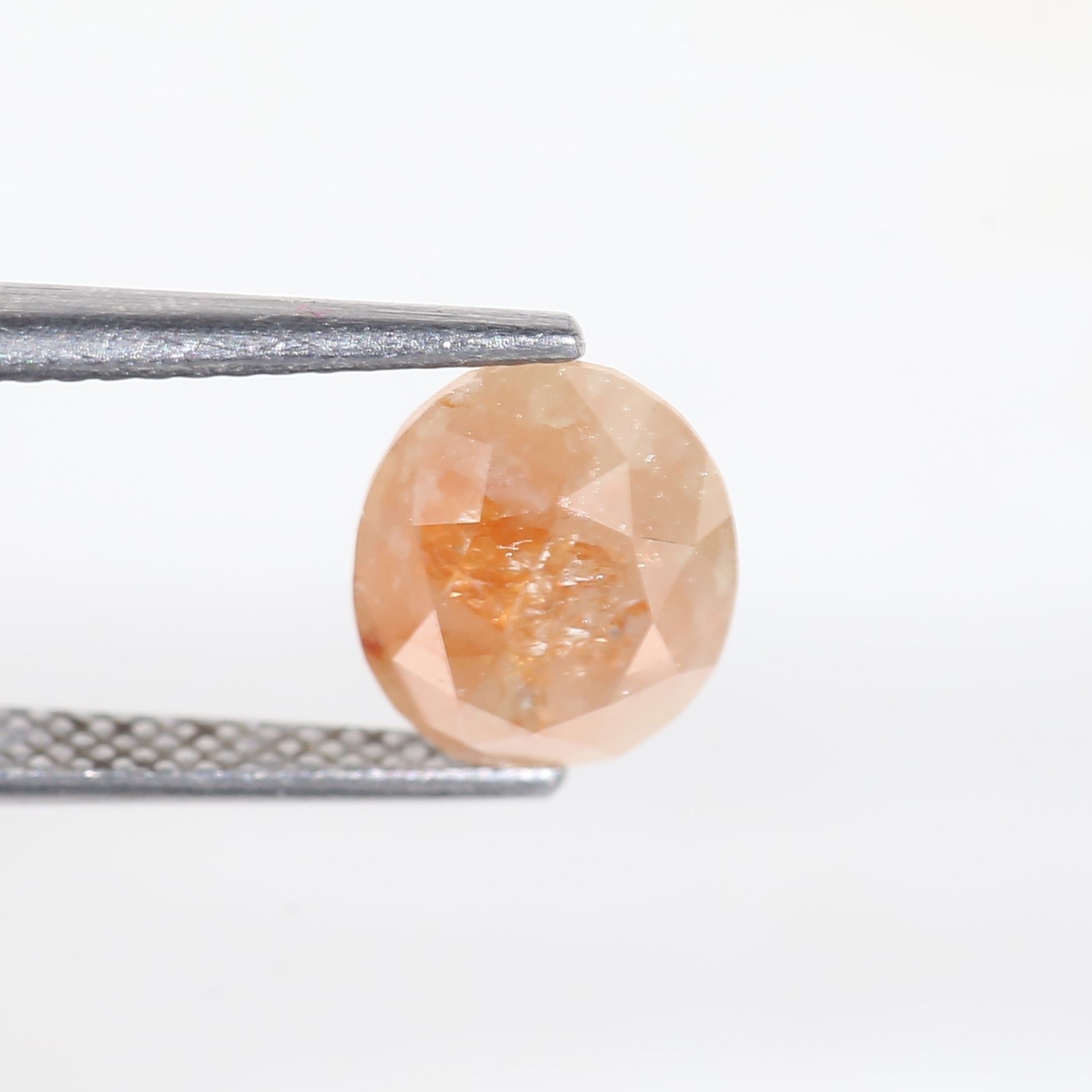 2.57 Carat Oval Cut Orange Salt and Pepper Diamond 7.4 MM