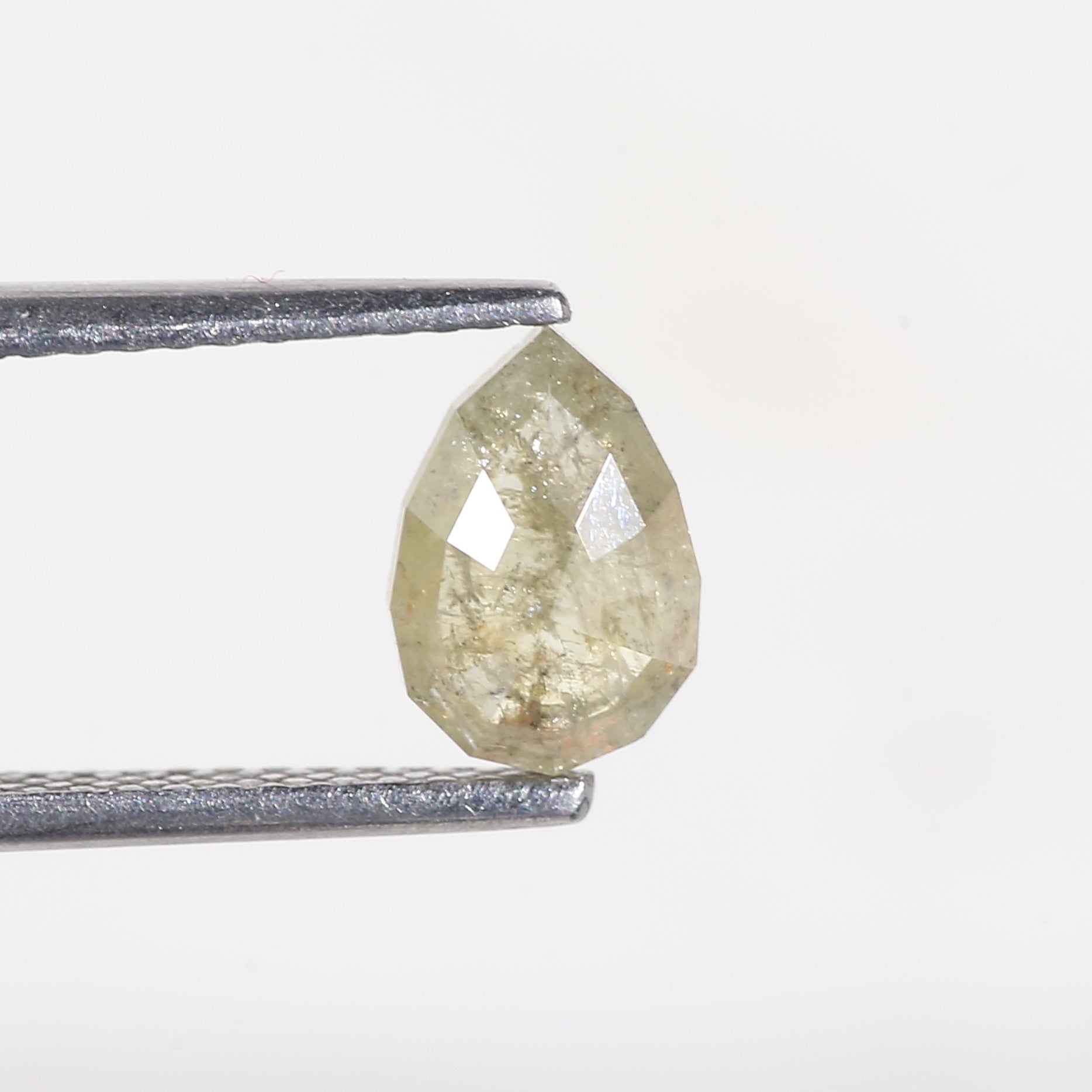 0.77 Carat Modified Pear Cut Salt and Pepper Diamond 7.65 MM