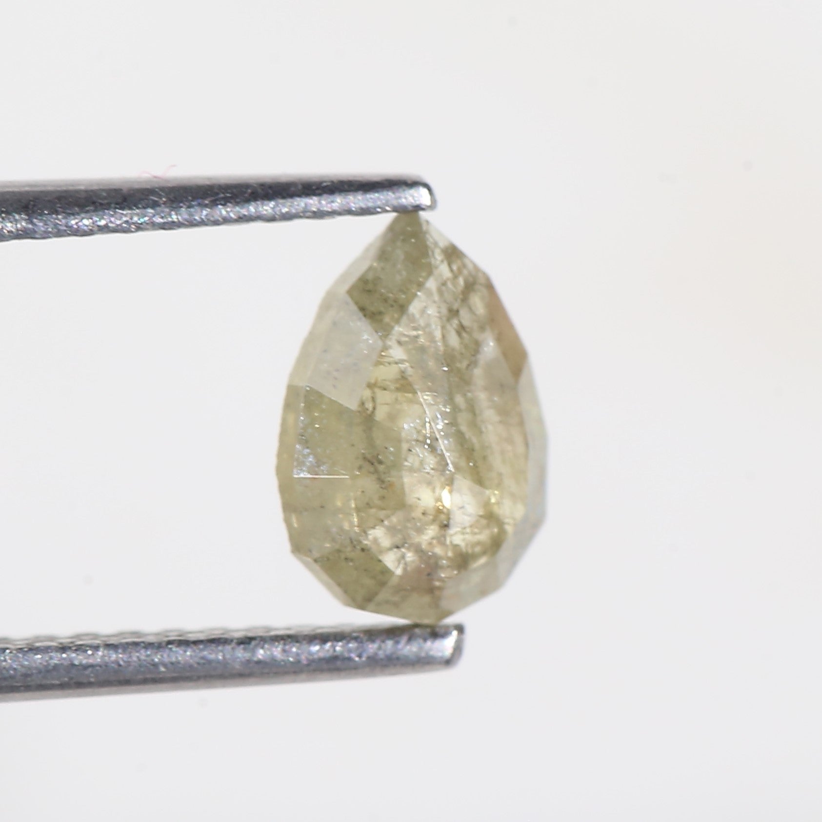 0.77 Carat Modified Pear Cut Salt and Pepper Diamond 7.65 MM