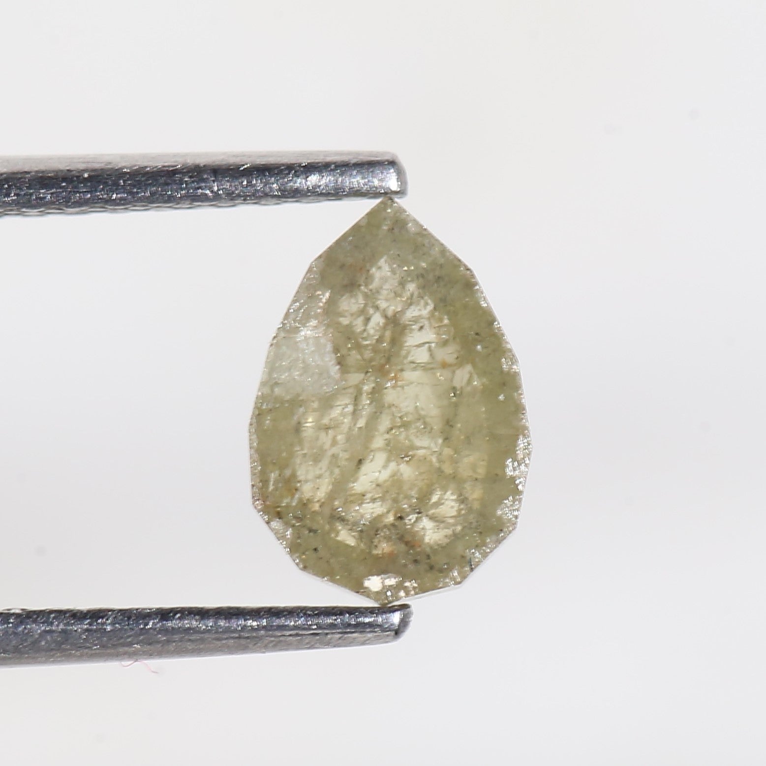 0.77 Carat Modified Pear Cut Salt and Pepper Diamond 7.65 MM