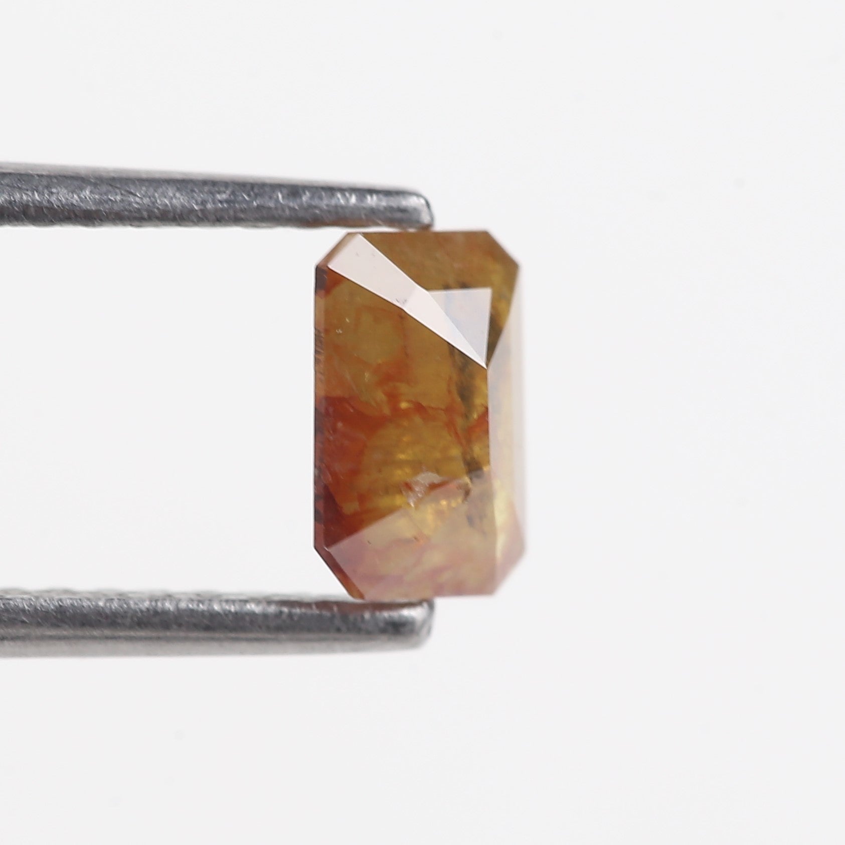 0.55 Carat Orange Natural Salt And pepper Diamond 6.11 MM