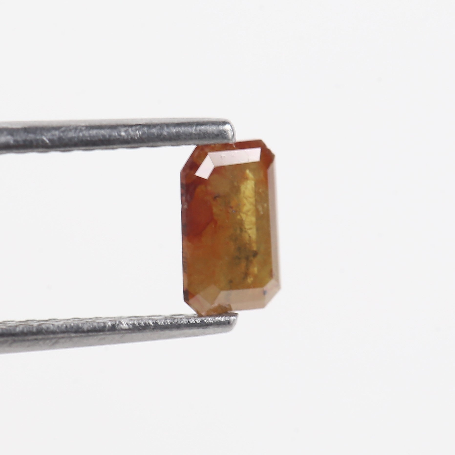 0.55 Carat Orange Natural Salt And pepper Diamond 6.11 MM