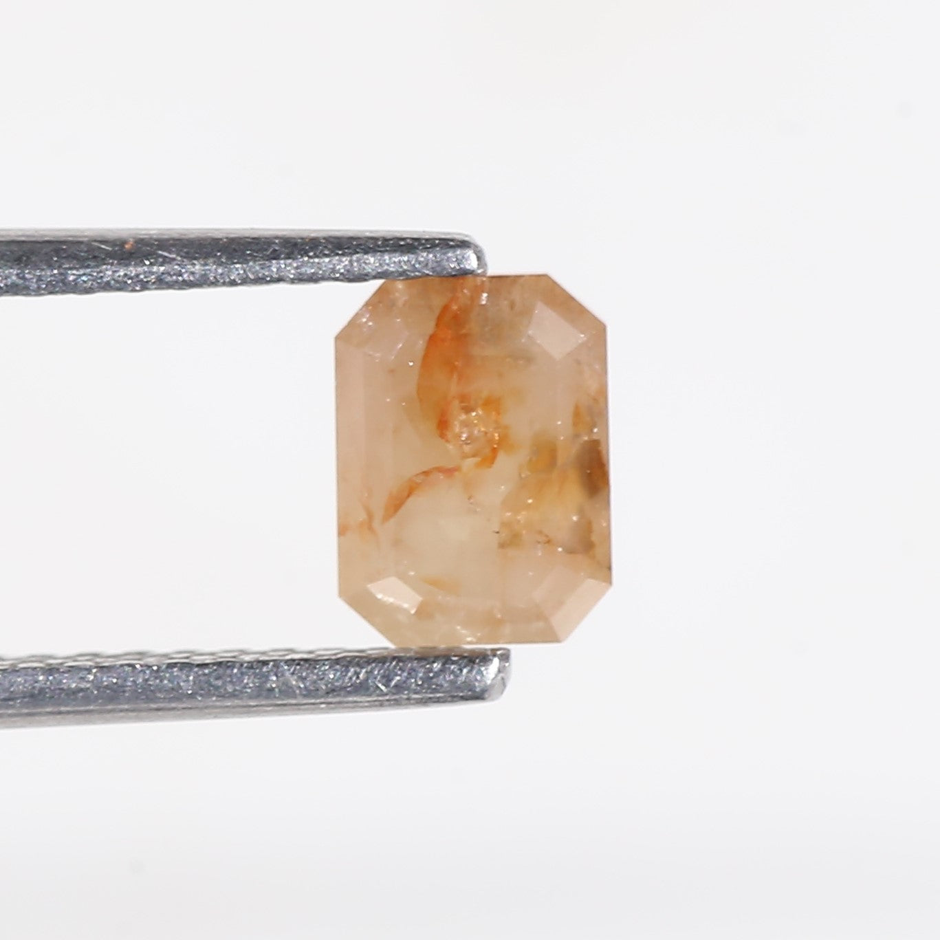 0.78 Carat Orange Natural Emerald Cut Diamond 6.1 MM