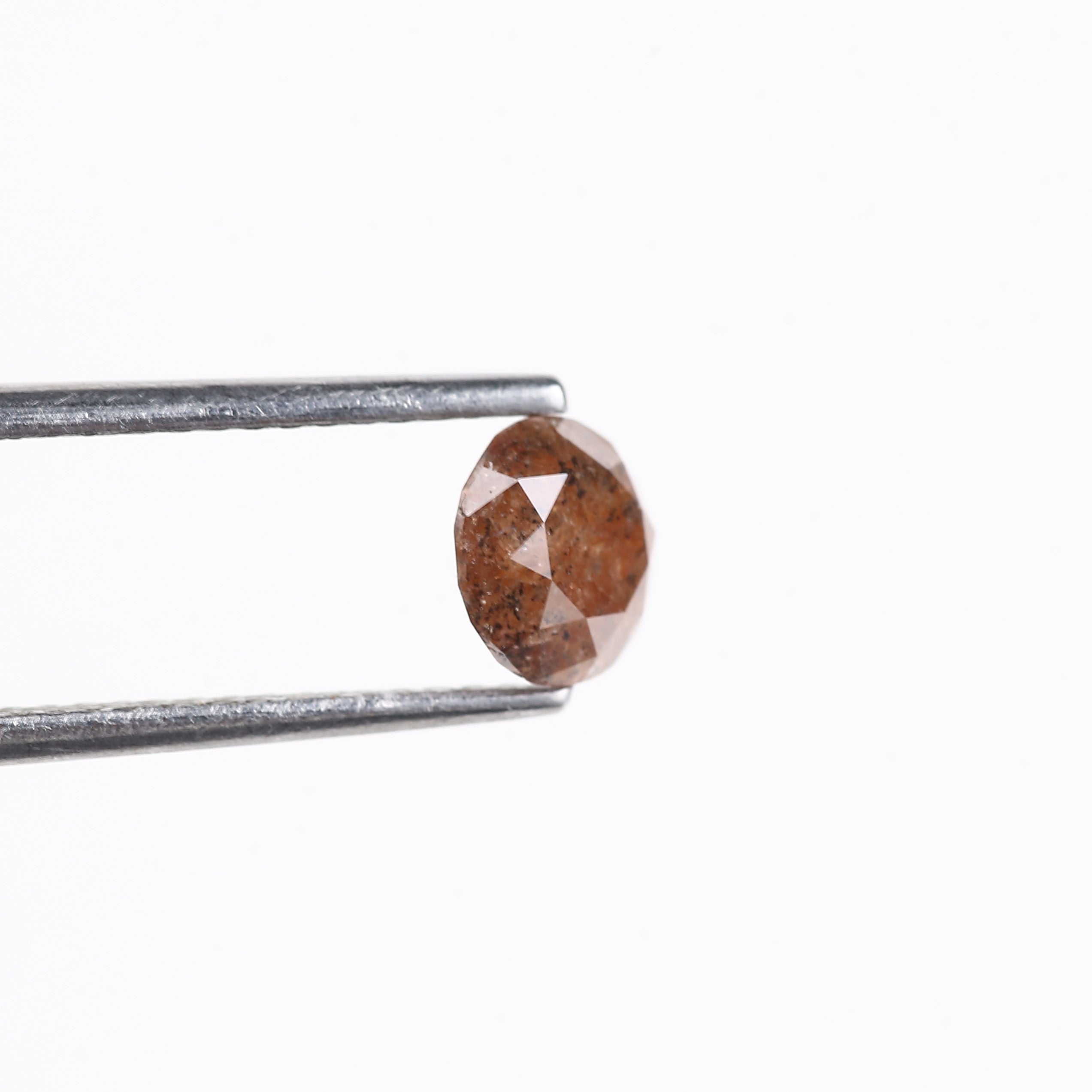 0.96 Carat Natural Reddish Orange Salt And Pepper Round Diamond 5.89 MM