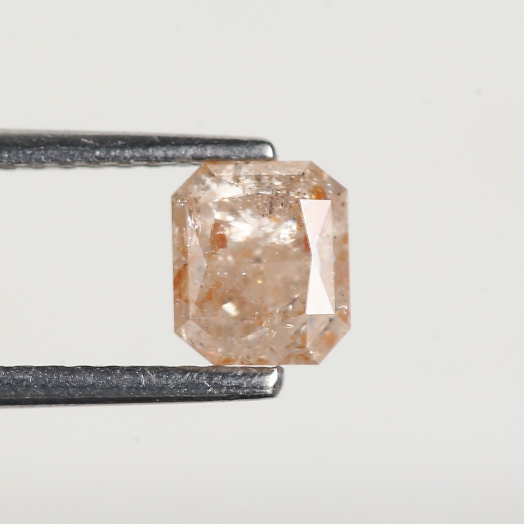 0.95 Carat Emerald Orange Salt and Pepper Diamond 5.6 MM