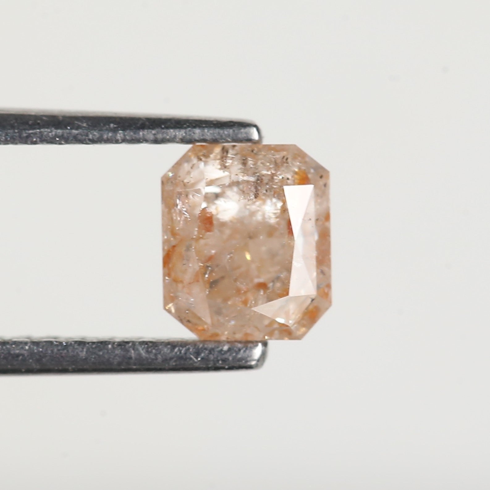 0.95 Carat Emerald Orange Salt and Pepper Diamond 5.6 MM