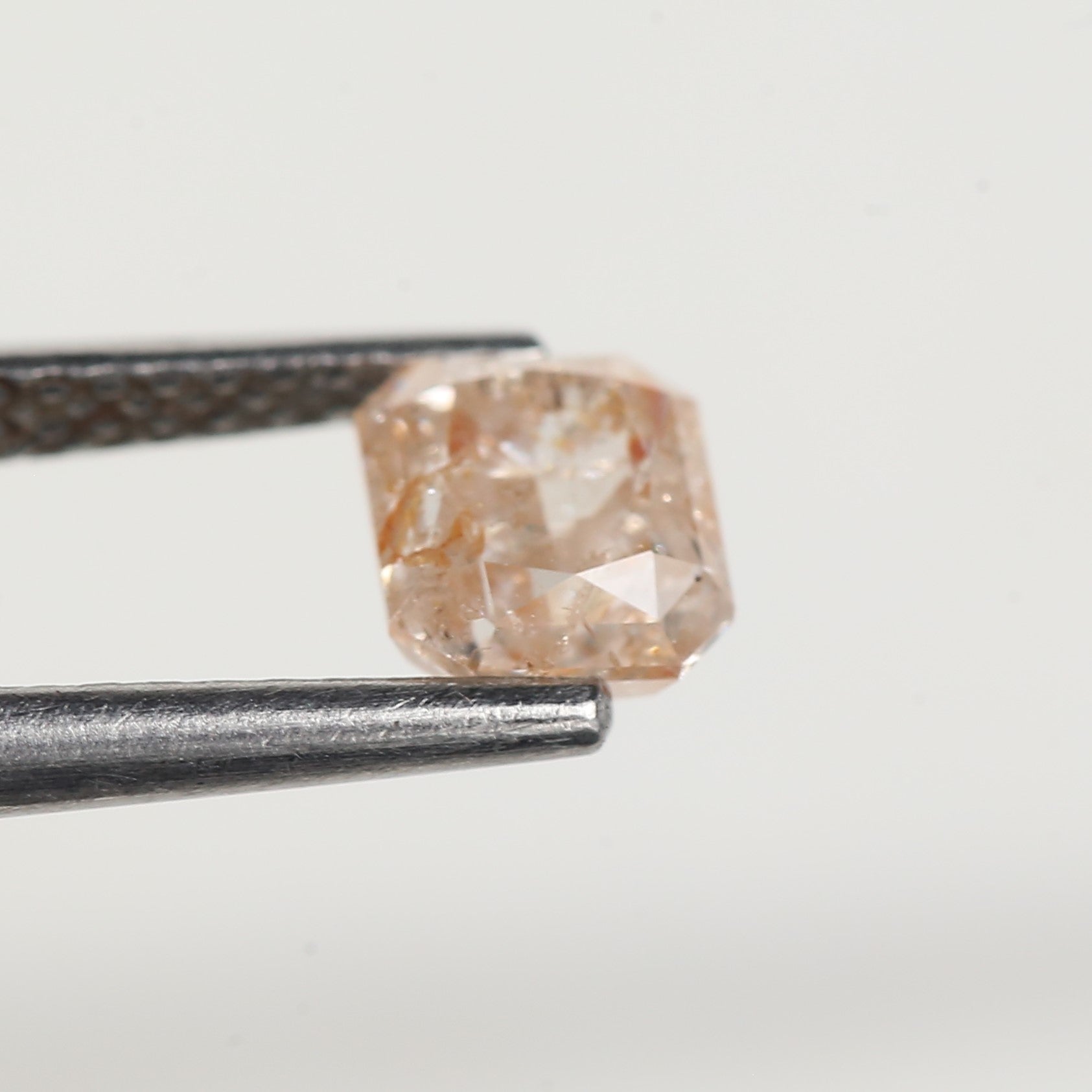 0.95 Carat Emerald Orange Salt and Pepper Diamond 5.6 MM