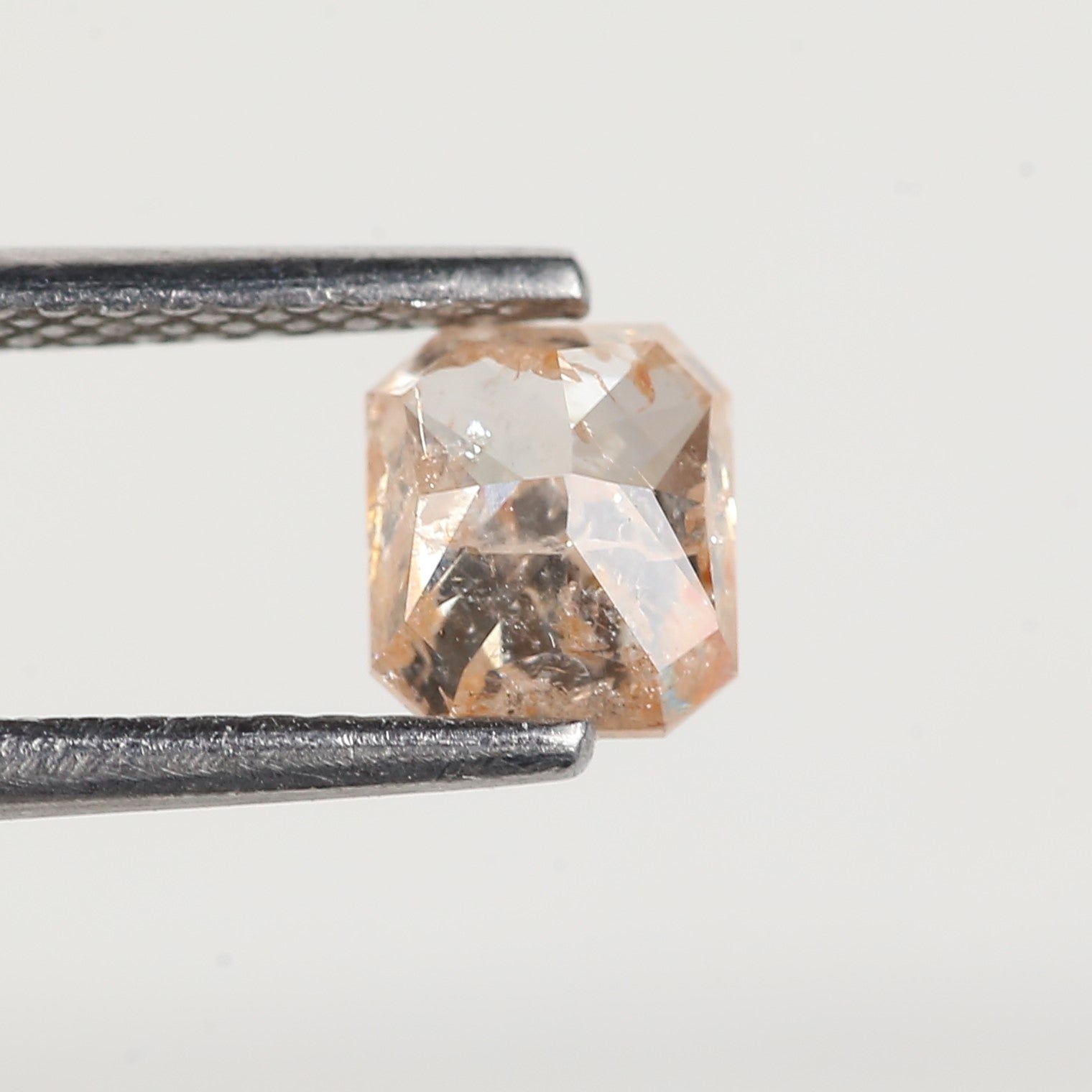 0.95 Carat Emerald Orange Salt and Pepper Diamond 5.6 MM