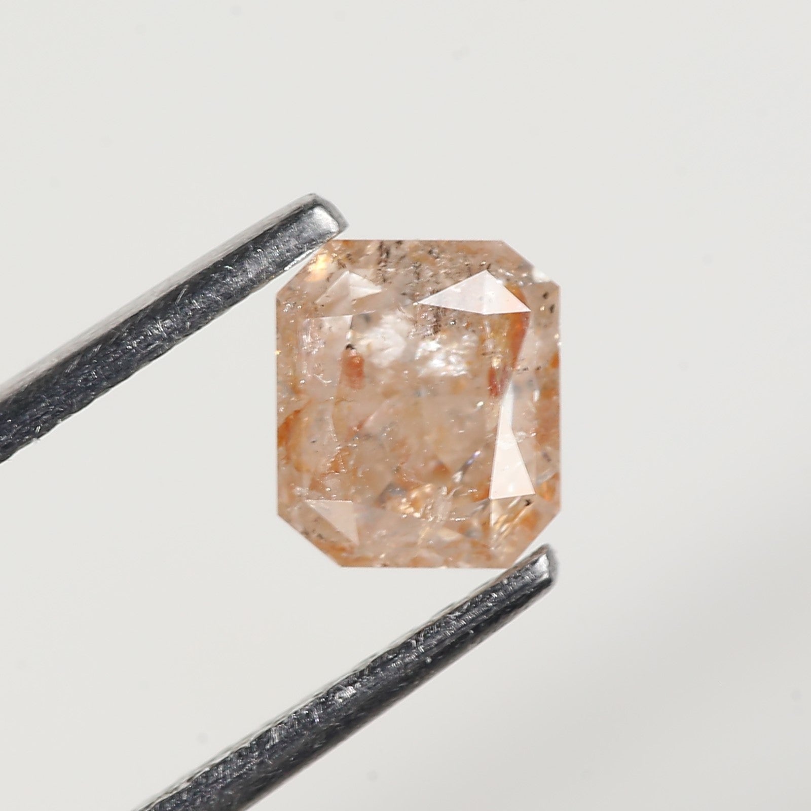0.95 Carat Emerald Orange Salt and Pepper Diamond 5.6 MM