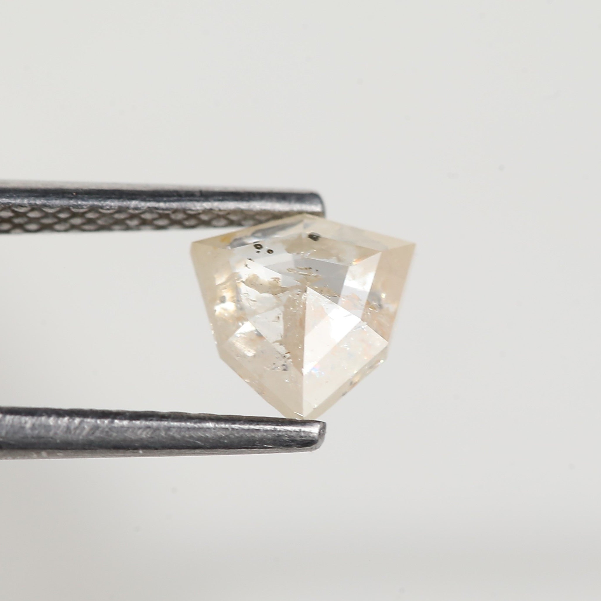 0.72 Carat Natural Shield Cut Orange Salt and Pepper Diamond 6.3 MM