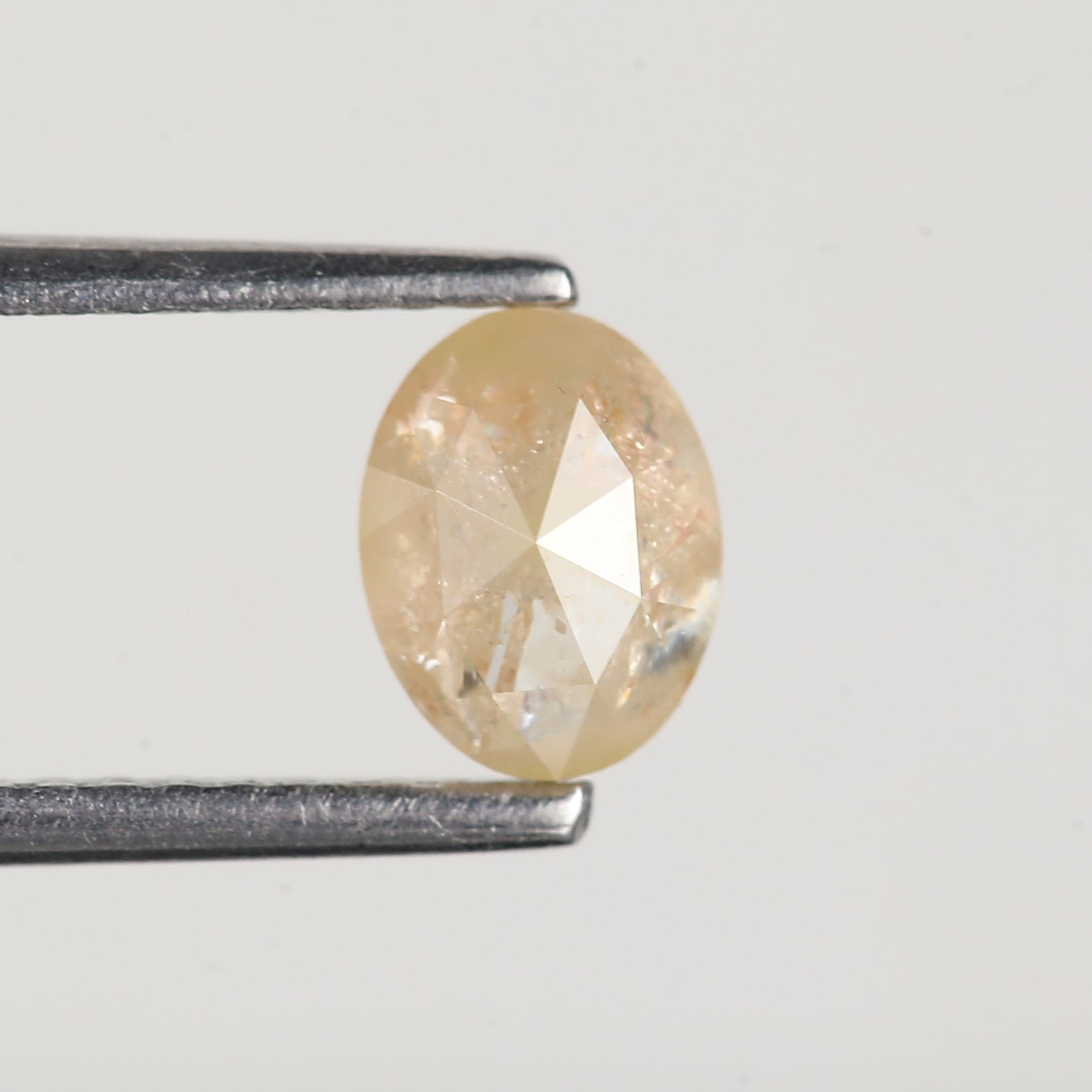 0.80 Carat Natural Yellow Oval Cut Salt and Pepper Diamond 6.2 MM