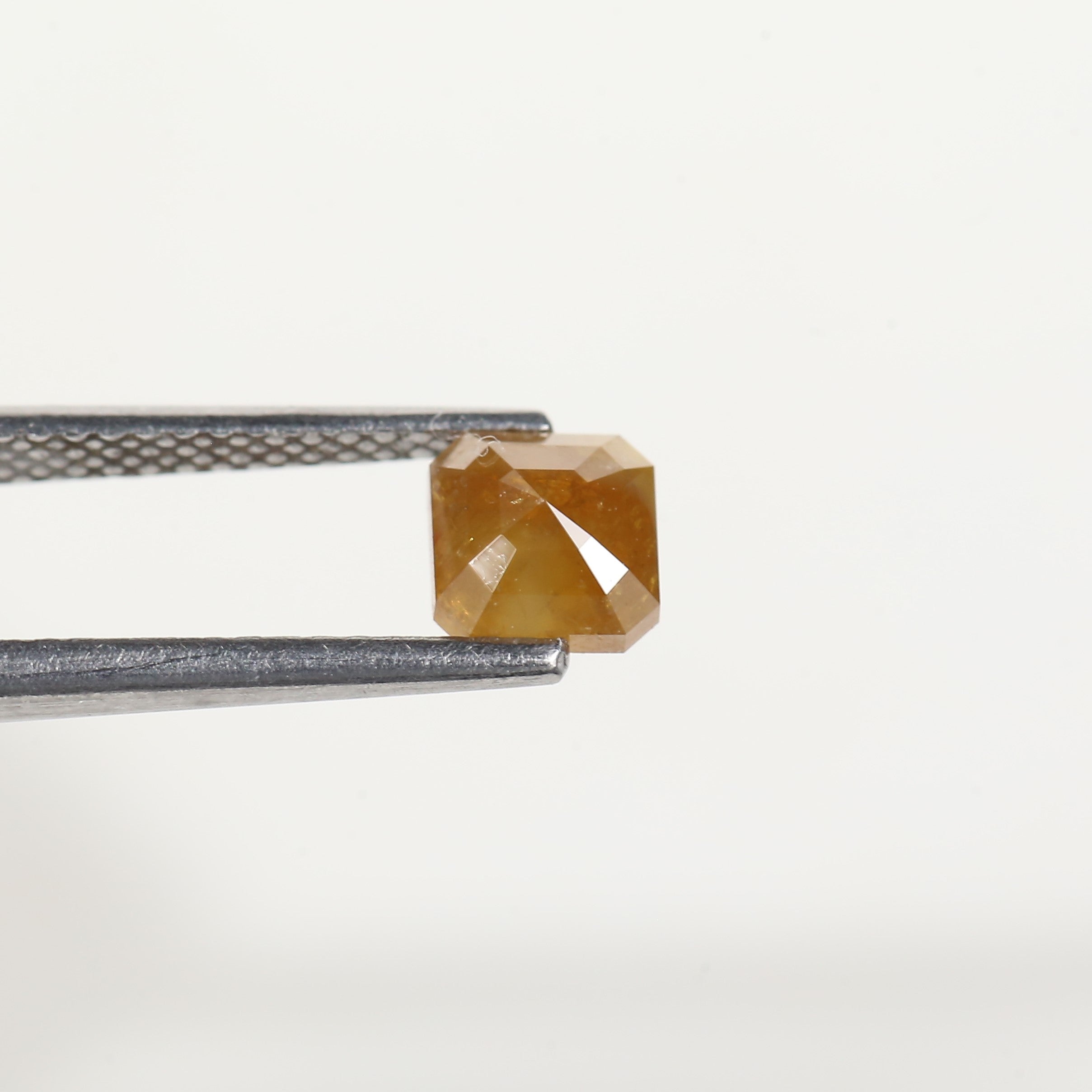 0.67 Carat Asscher Cut Yellow Salt and Pepper Diamond 5 MM