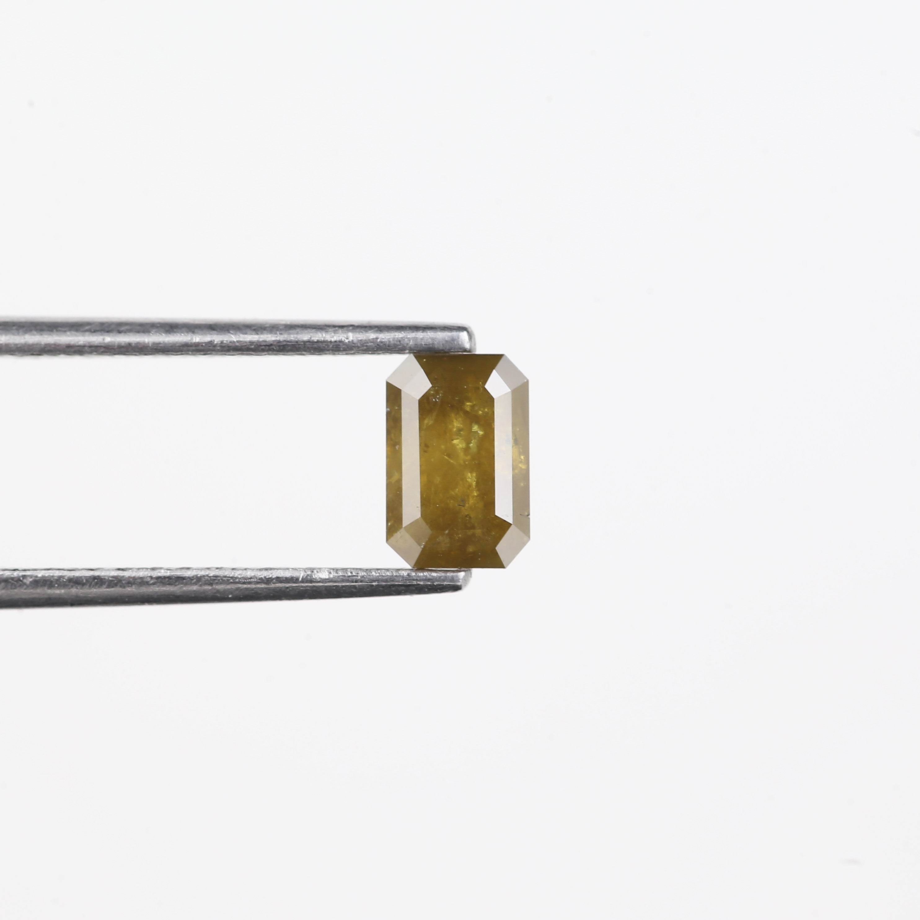 0.72 Carat Natural Yellow Emerald Cut Salt And Pepper Diamond 6.16 MM
