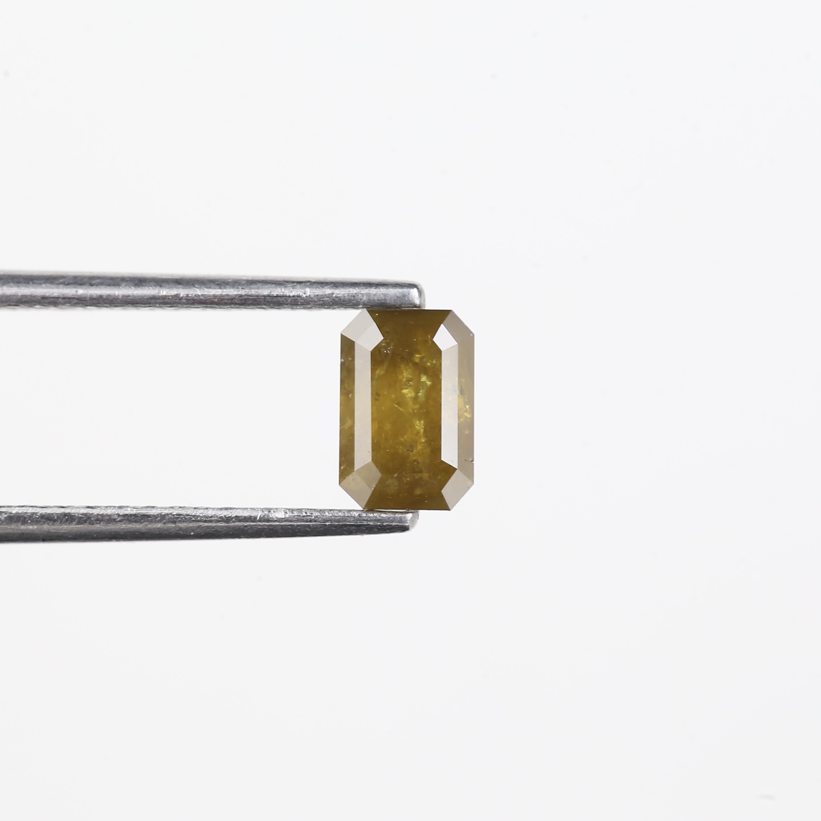0.72 Carat Natural Yellow Emerald Cut Salt And Pepper Diamond 6.16 MM