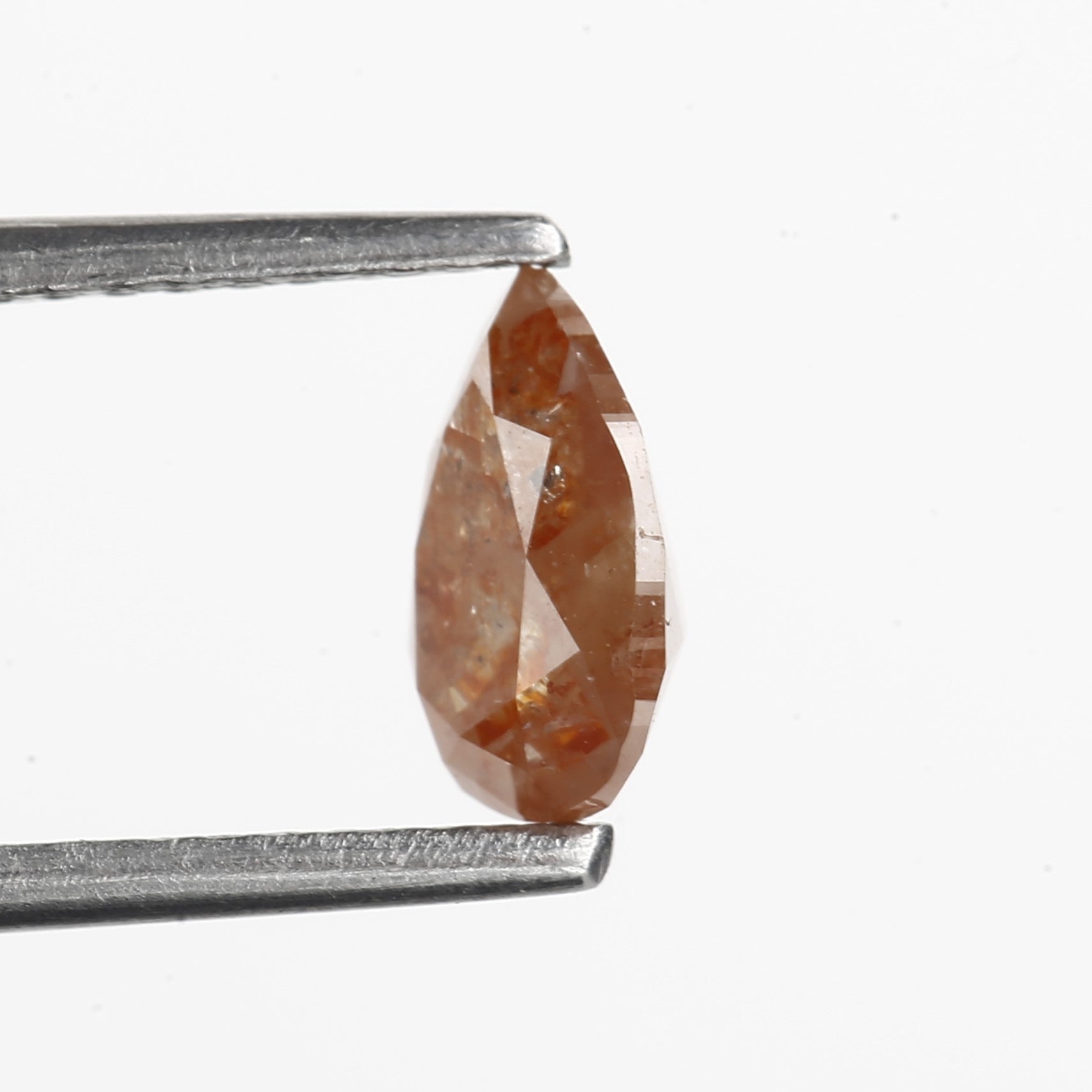 0.79 Carat Fancy Orange Pear Salt and Pepper Diamond 7.12 MM