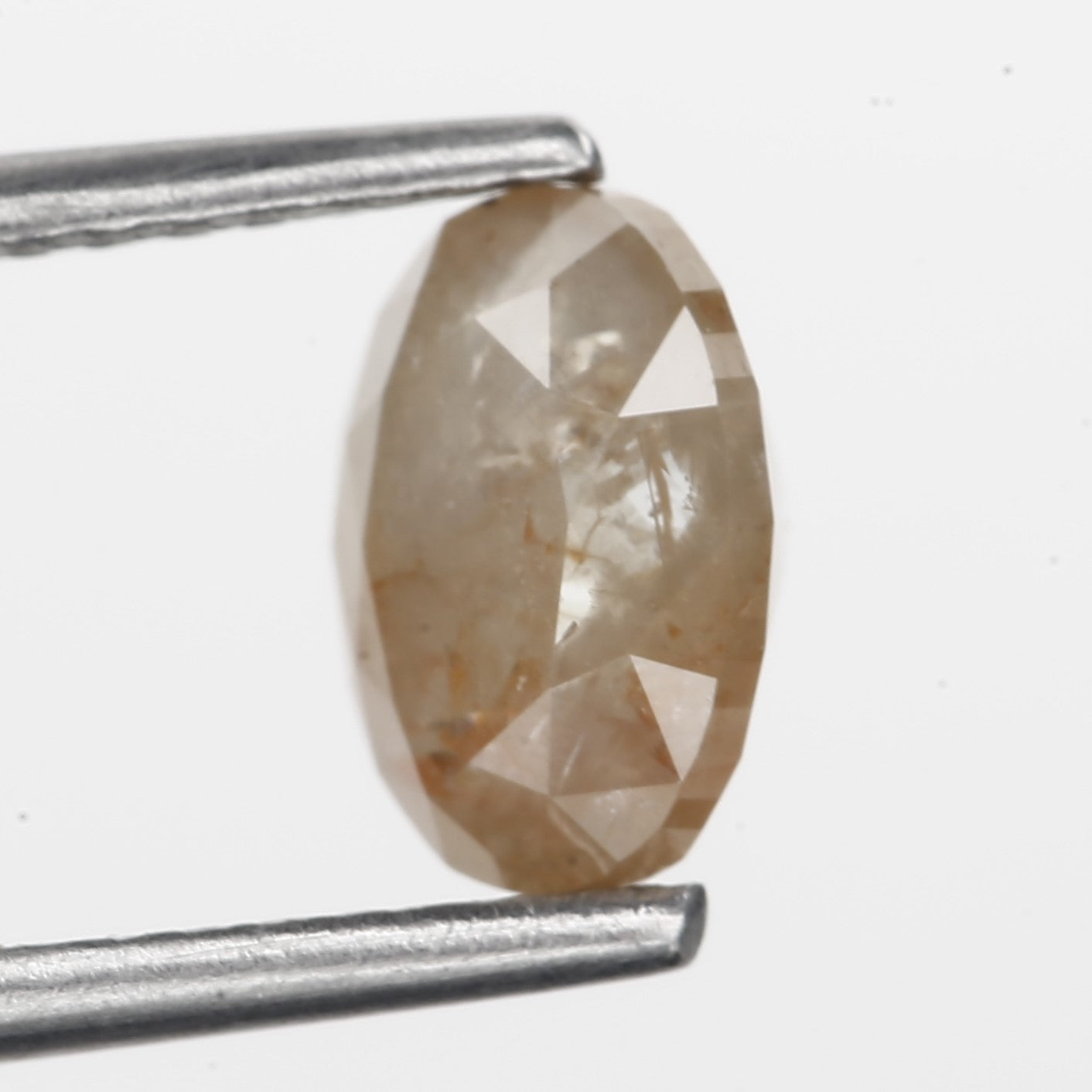 1.26 Carat Oval Cut Salt and Pepper Diamond 7.05 MM