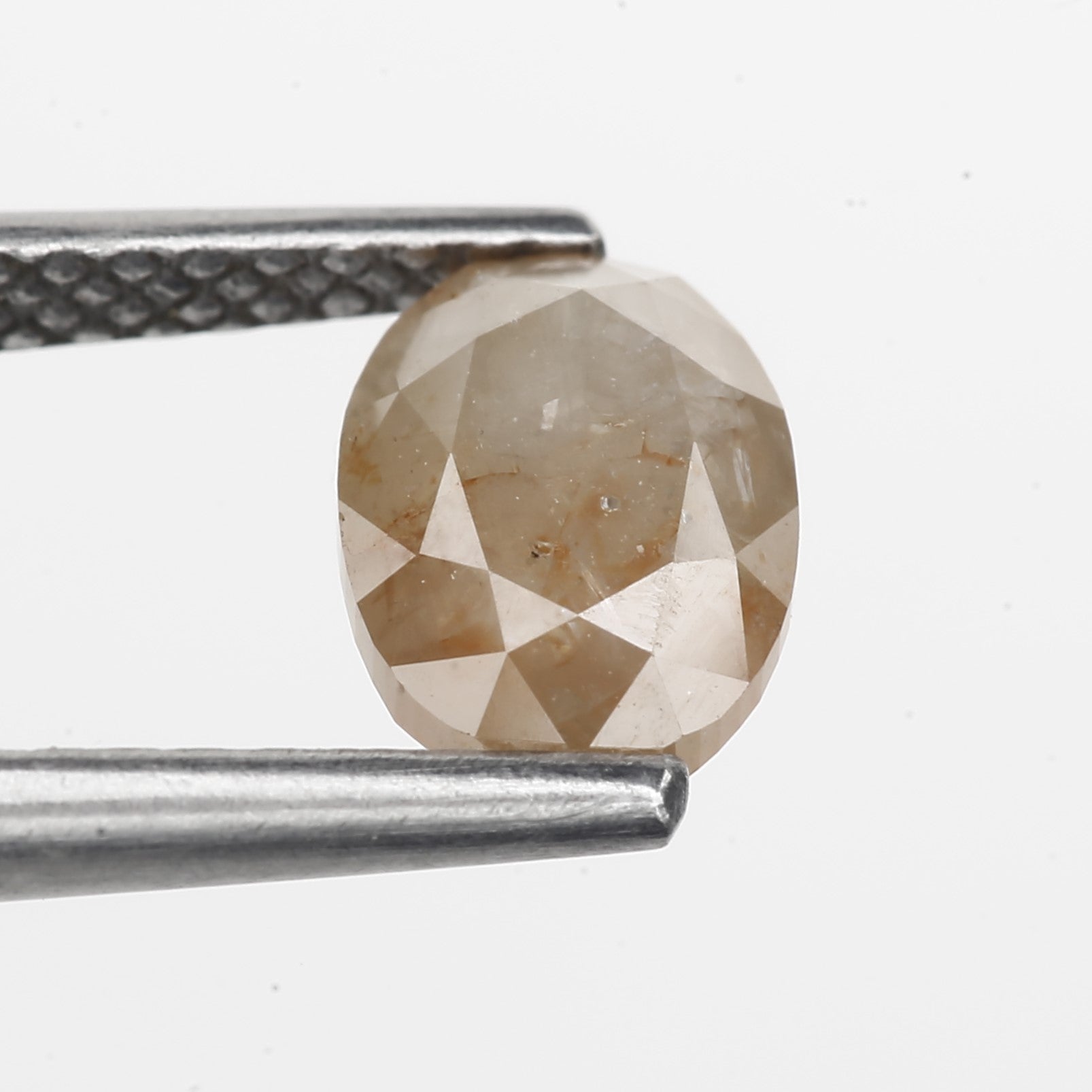 1.26 Carat Oval Cut Salt and Pepper Diamond 7.05 MM