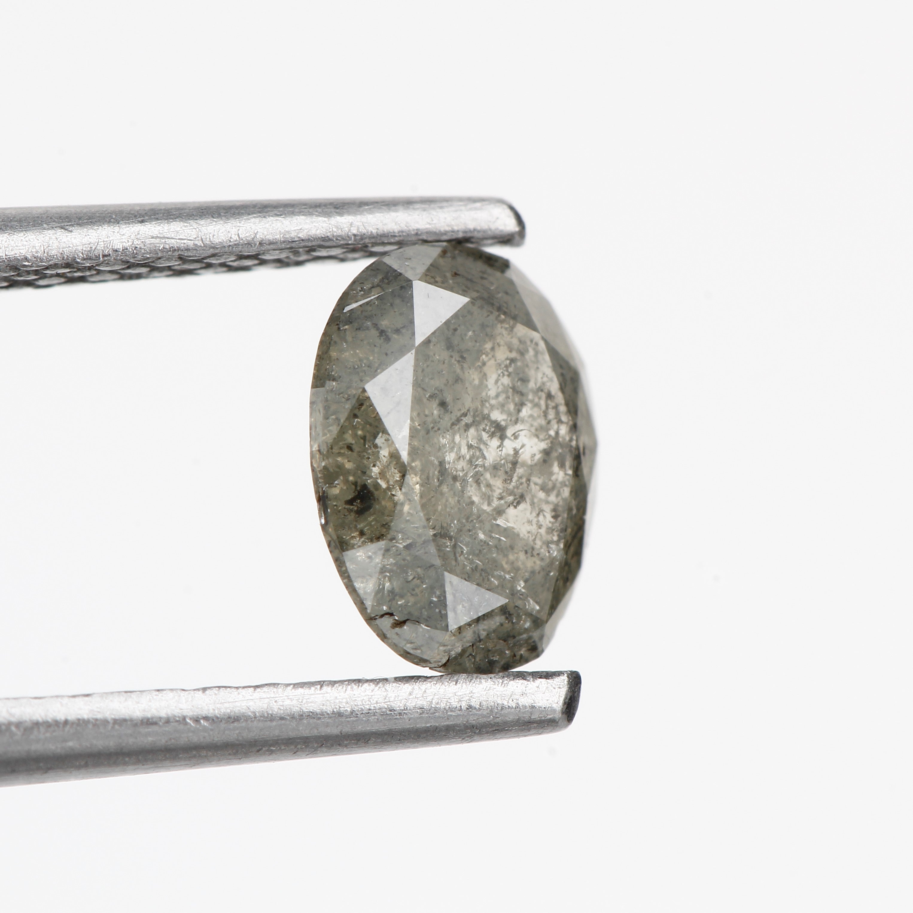 0.66 Carat Salt and Pepper Loose Oval Diamond 6.30 MM