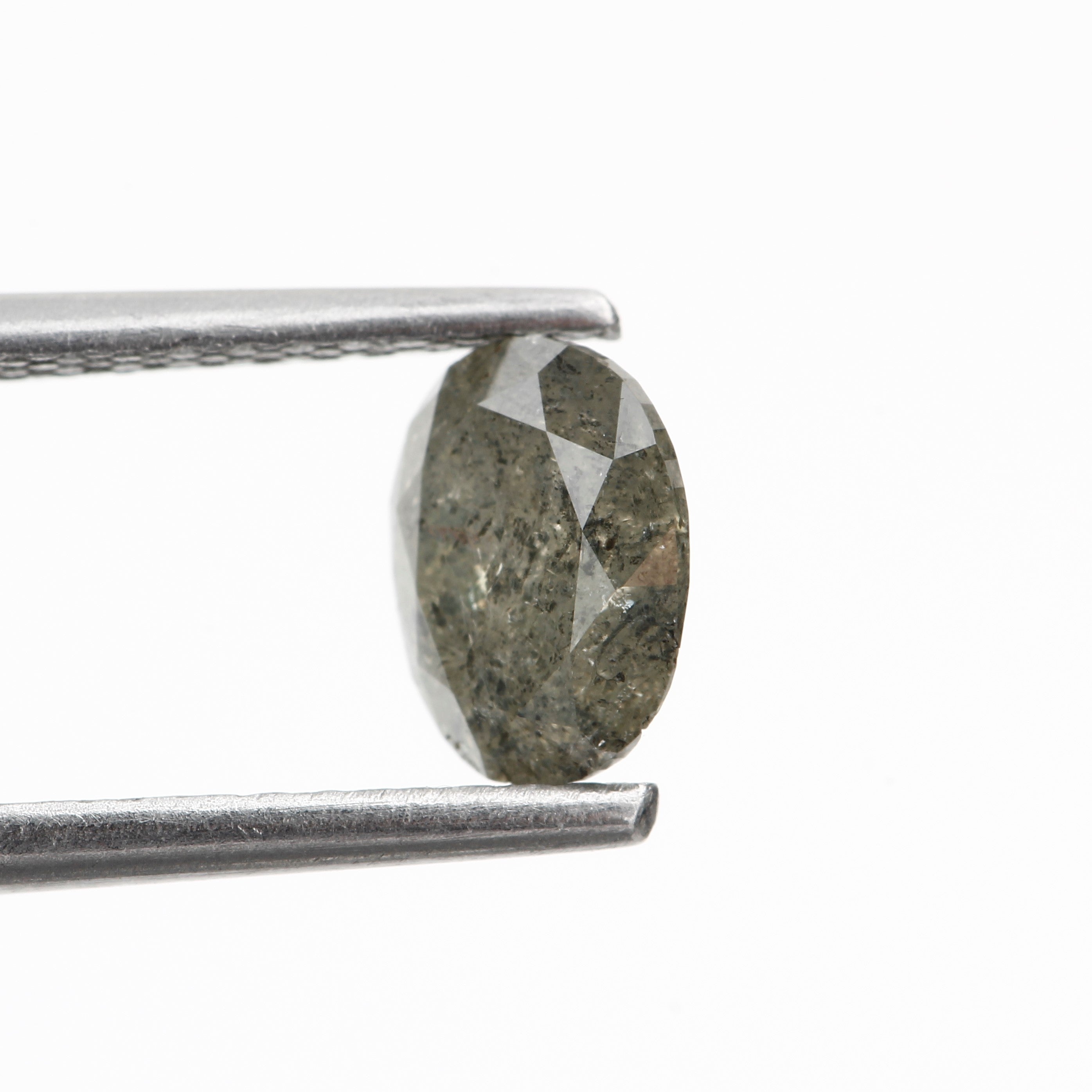 0.66 Carat Salt and Pepper Loose Oval Diamond 6.30 MM