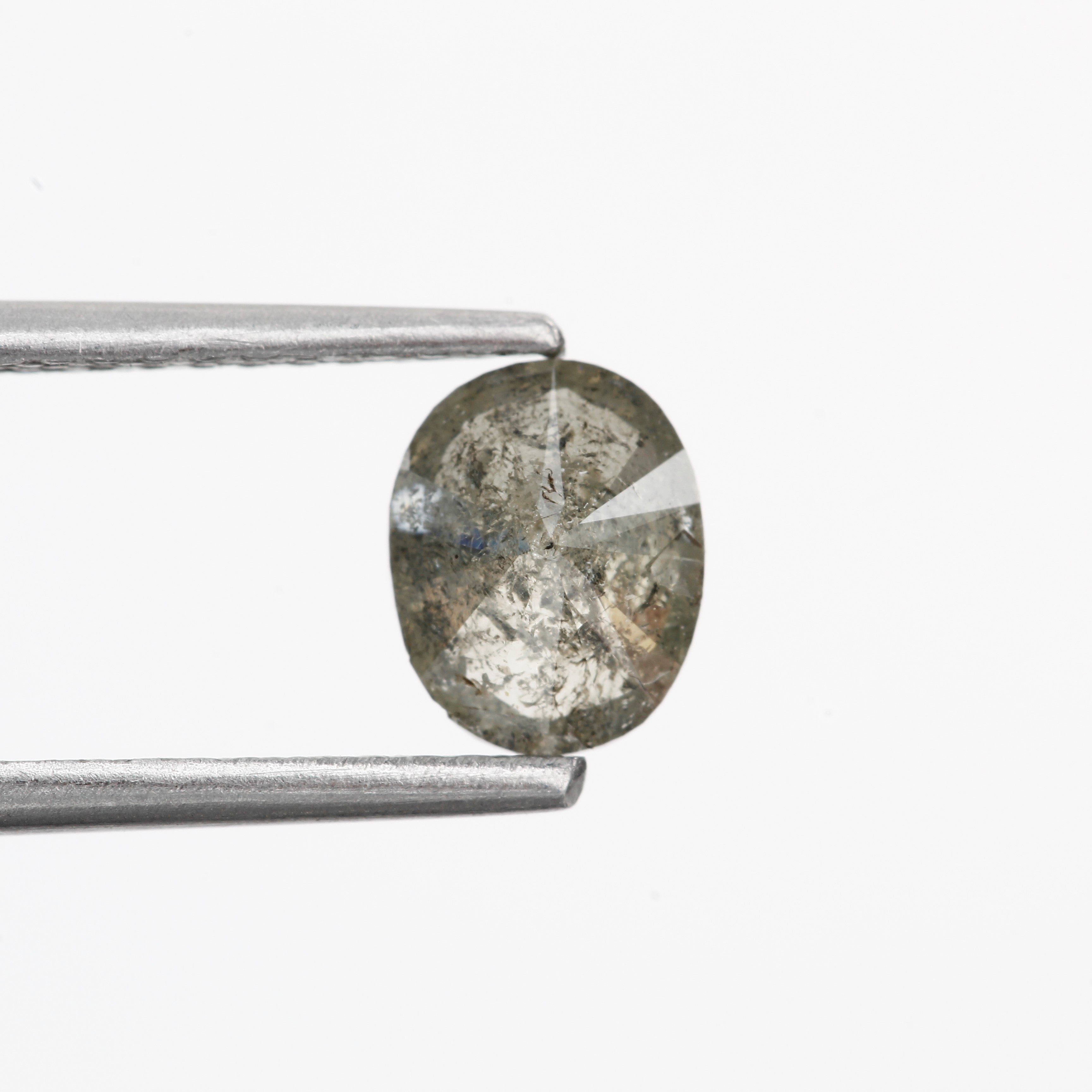 0.66 Carat Salt and Pepper Loose Oval Diamond 6.30 MM