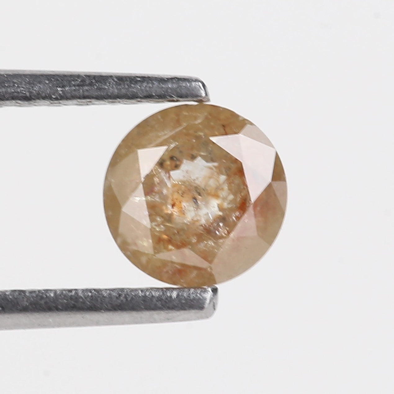 0.55 Carat Salt And Pepper Diamond Orange Round Brilliant Cut Diamond 4.95 MM