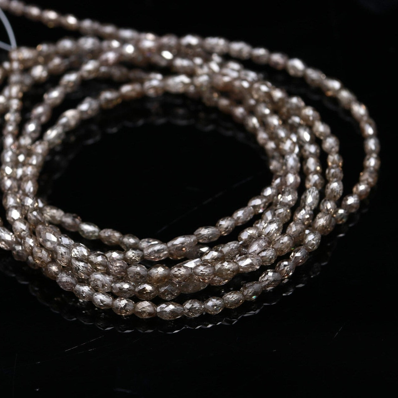 String of pearls on a black background