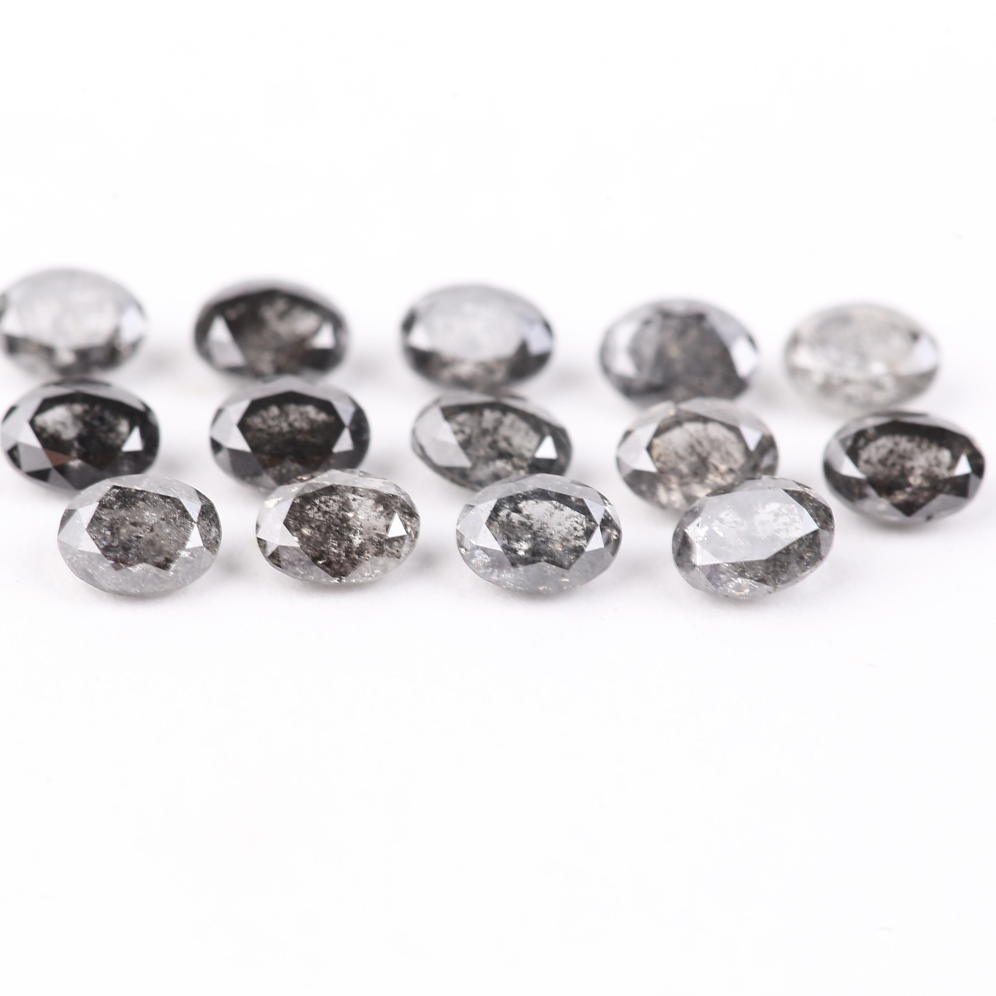Hand-selected oval salt and pepper diamonds for artisan jewelry