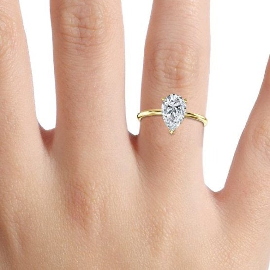 Bdaya Pear Solitaire Engagement Ring 14K / 18K Solid Gold