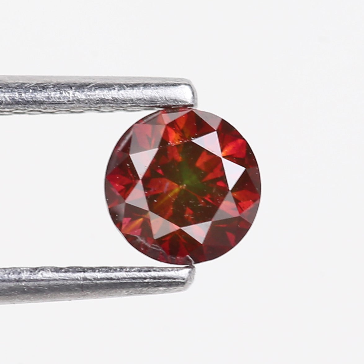 0.32 Carat Natural Fancy Pink Red Salt and Pepper Diamond 4.4 MM