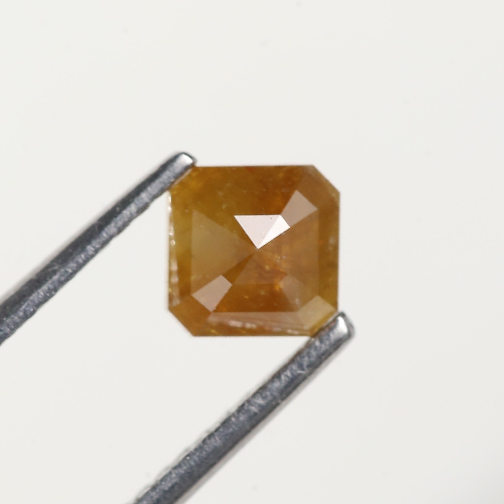 0.67 Carat Asscher Cut Yellow Salt and Pepper Diamond 5 MM