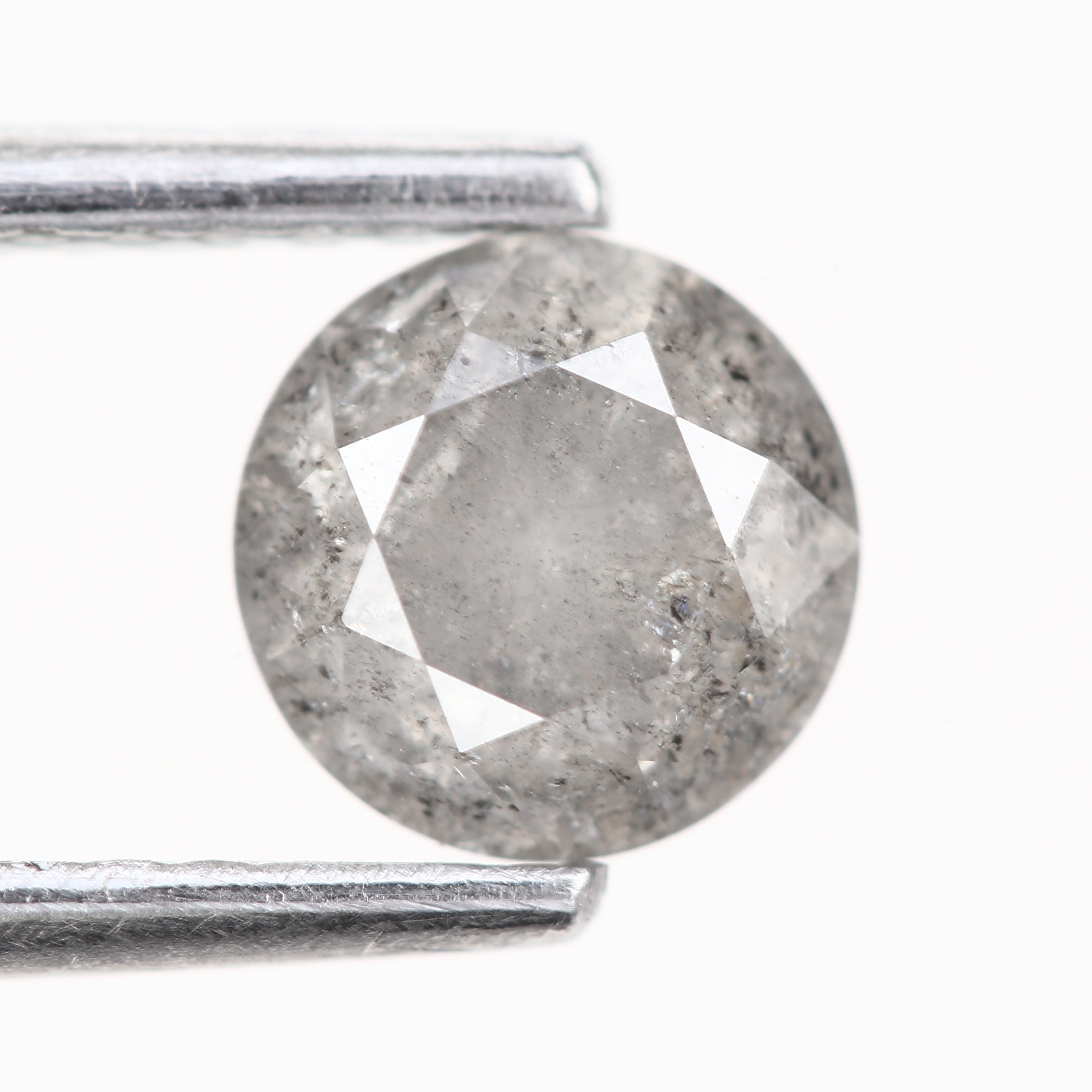 Gray Speckled Round Diamond Engagement Ring